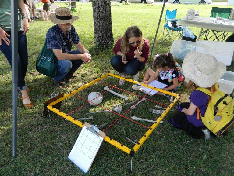 photo of texas archaeology month activity; kids mapping