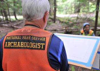 Photo of NPS archaeologist with safety vest