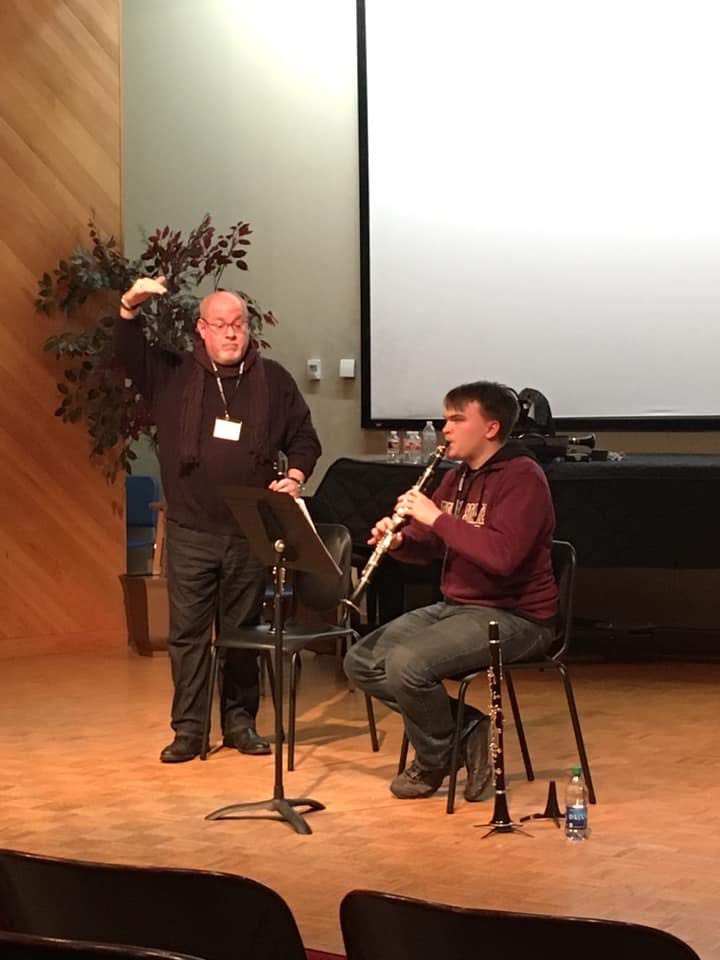 Texas State student Hugh Pauwels performs during Gregory Raden's masterclass.