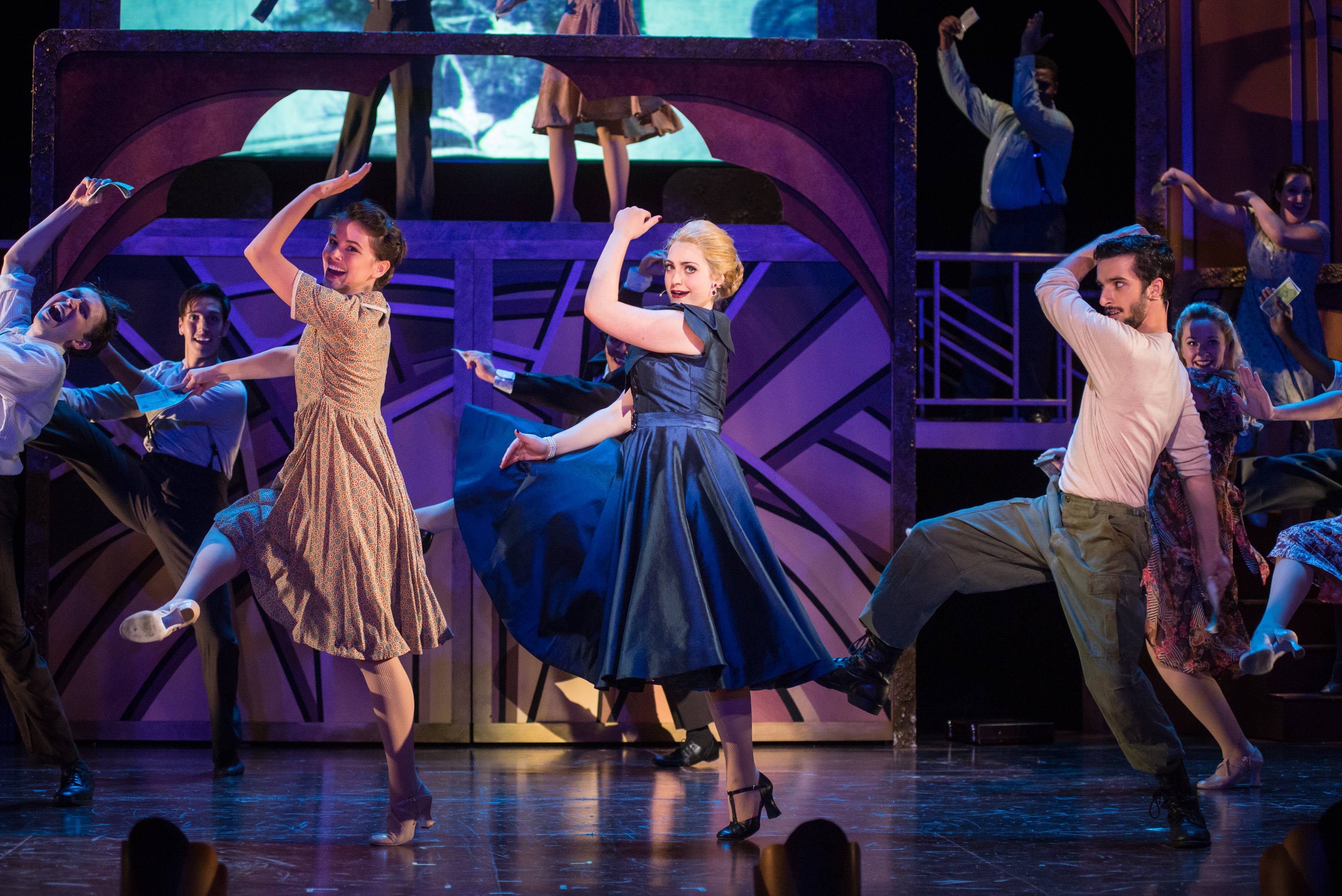 Evita dancing on stage at Texas State University