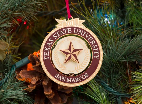 TXST holiday ornament from 2011 with the Texas State University - San Marcos name