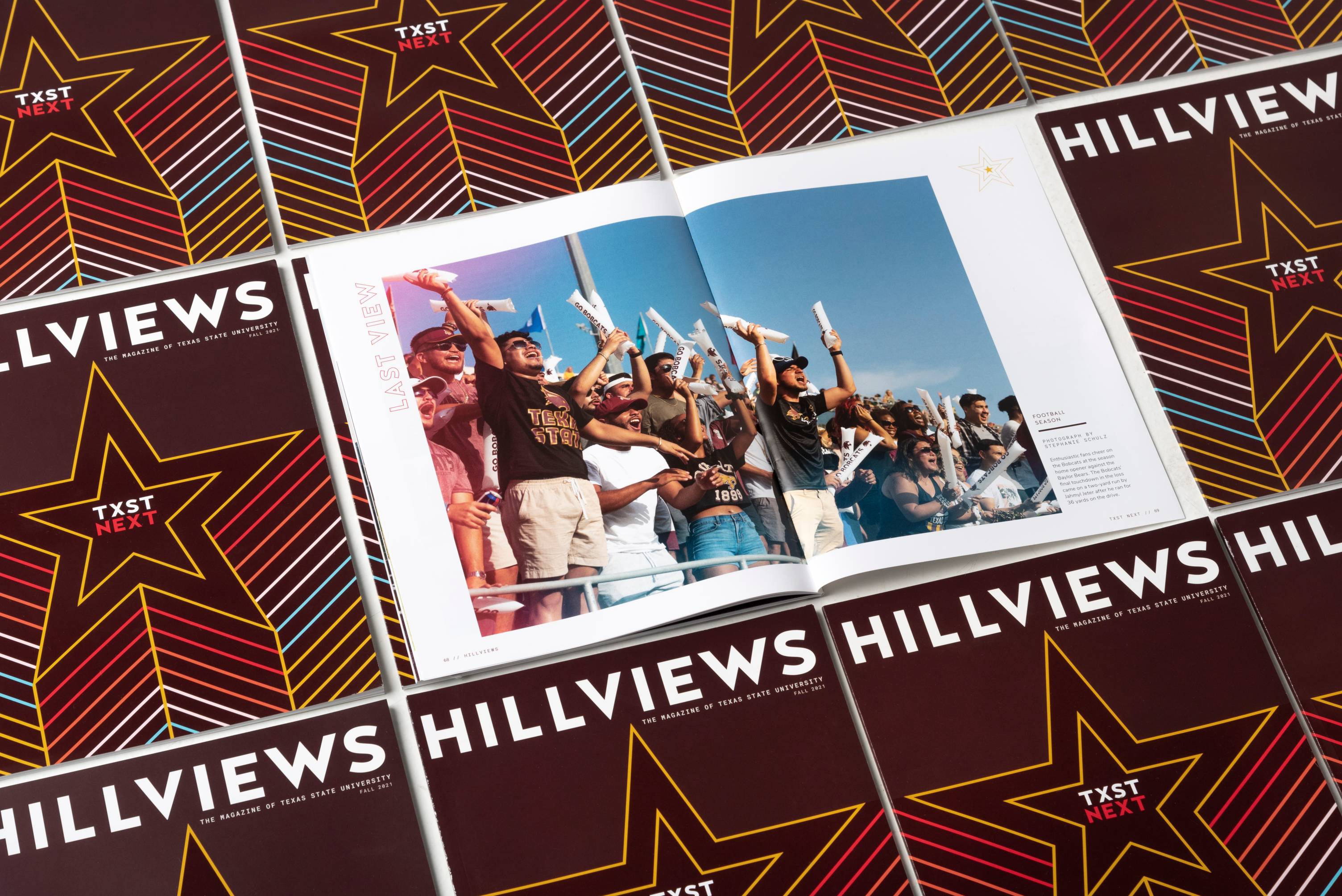Grid of Hillviews magazine covers with the center issue open to a two-page photo of football fans