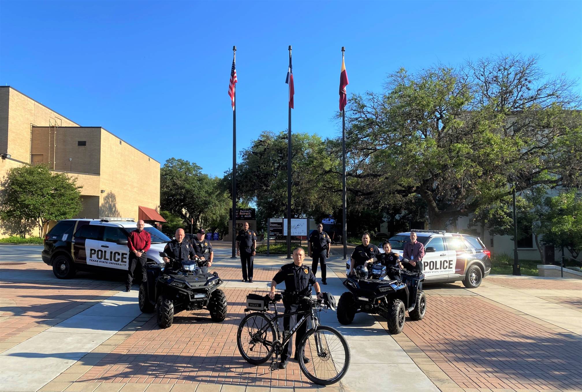 UPD Officers with their vehicles