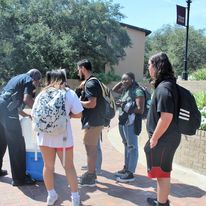 Two Officers Handing Out Easter Eggs