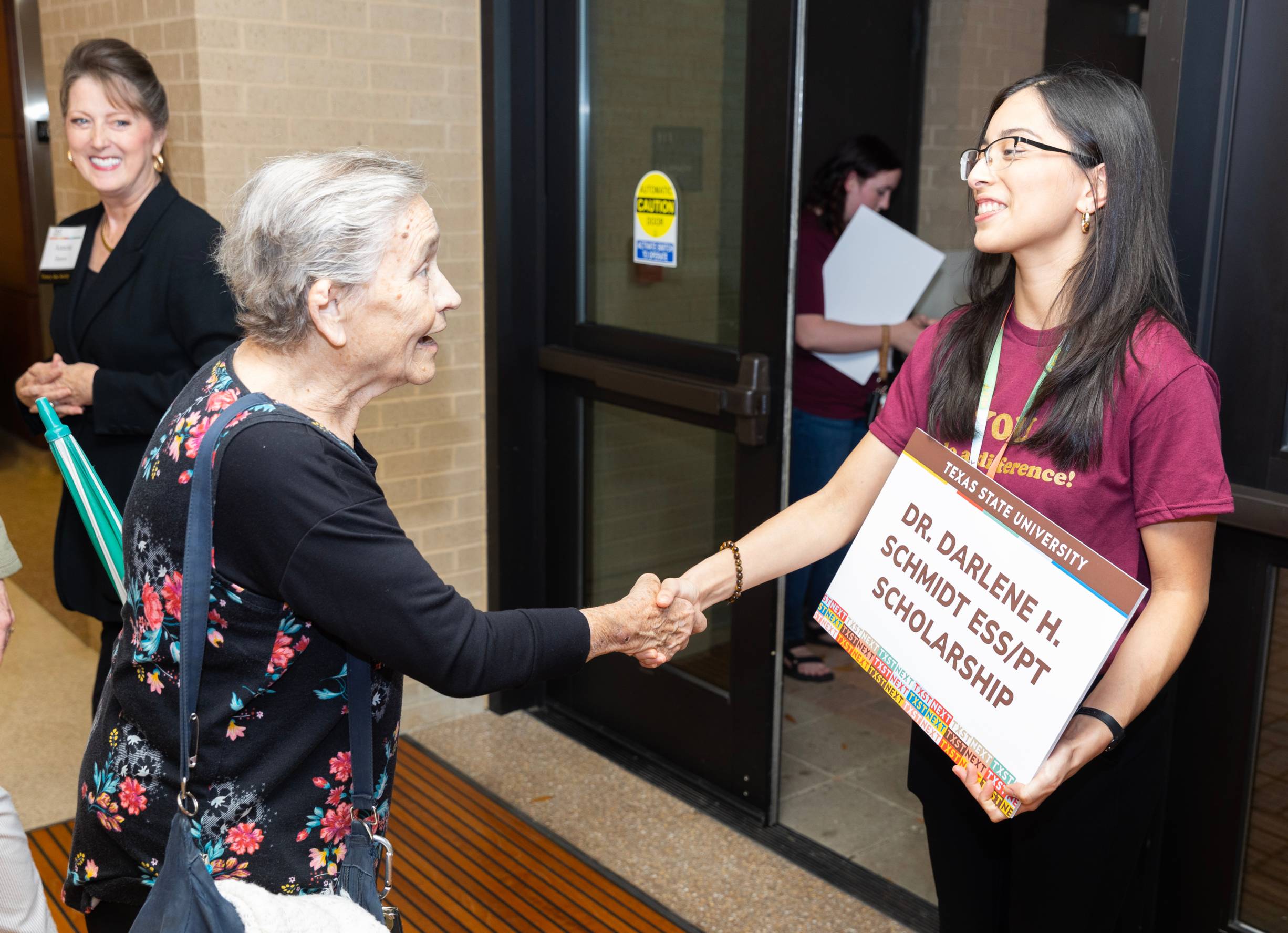 Student greets donor Darlene Schmidt