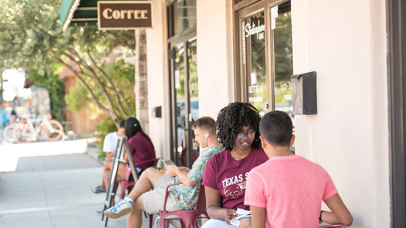students at a San Marcos coffee shop