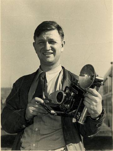 photo of man holding camera from russell lee collection