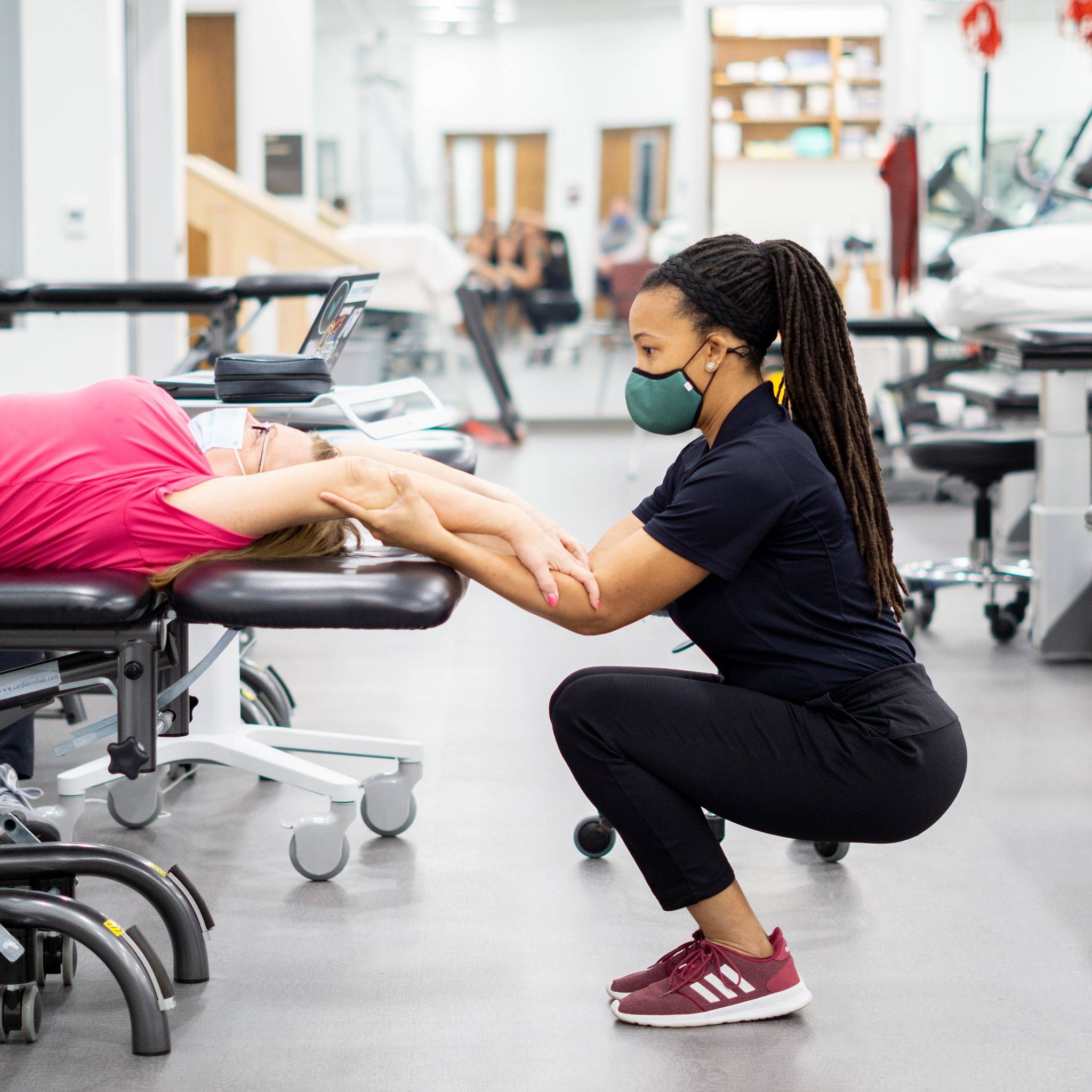 student PT treating patient