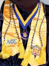 the Alpha Phi Sigma honor regalia for graduation and other ceremonies