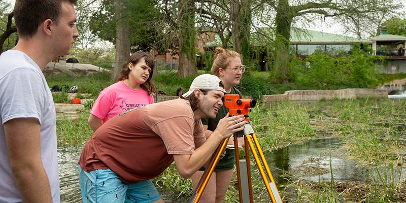 students surveying