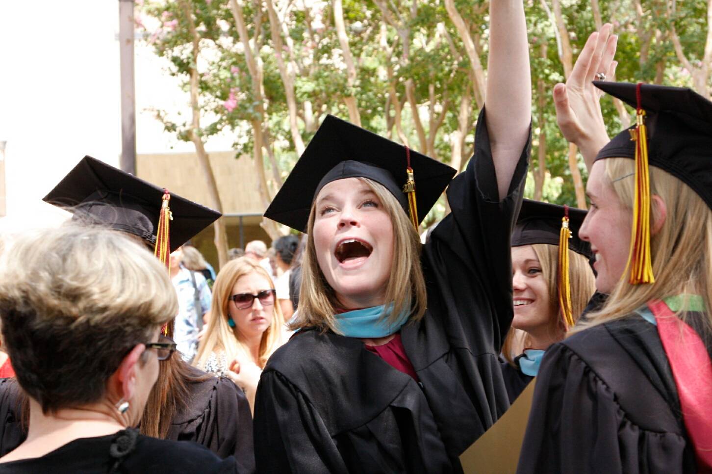 photo of gaduates outside