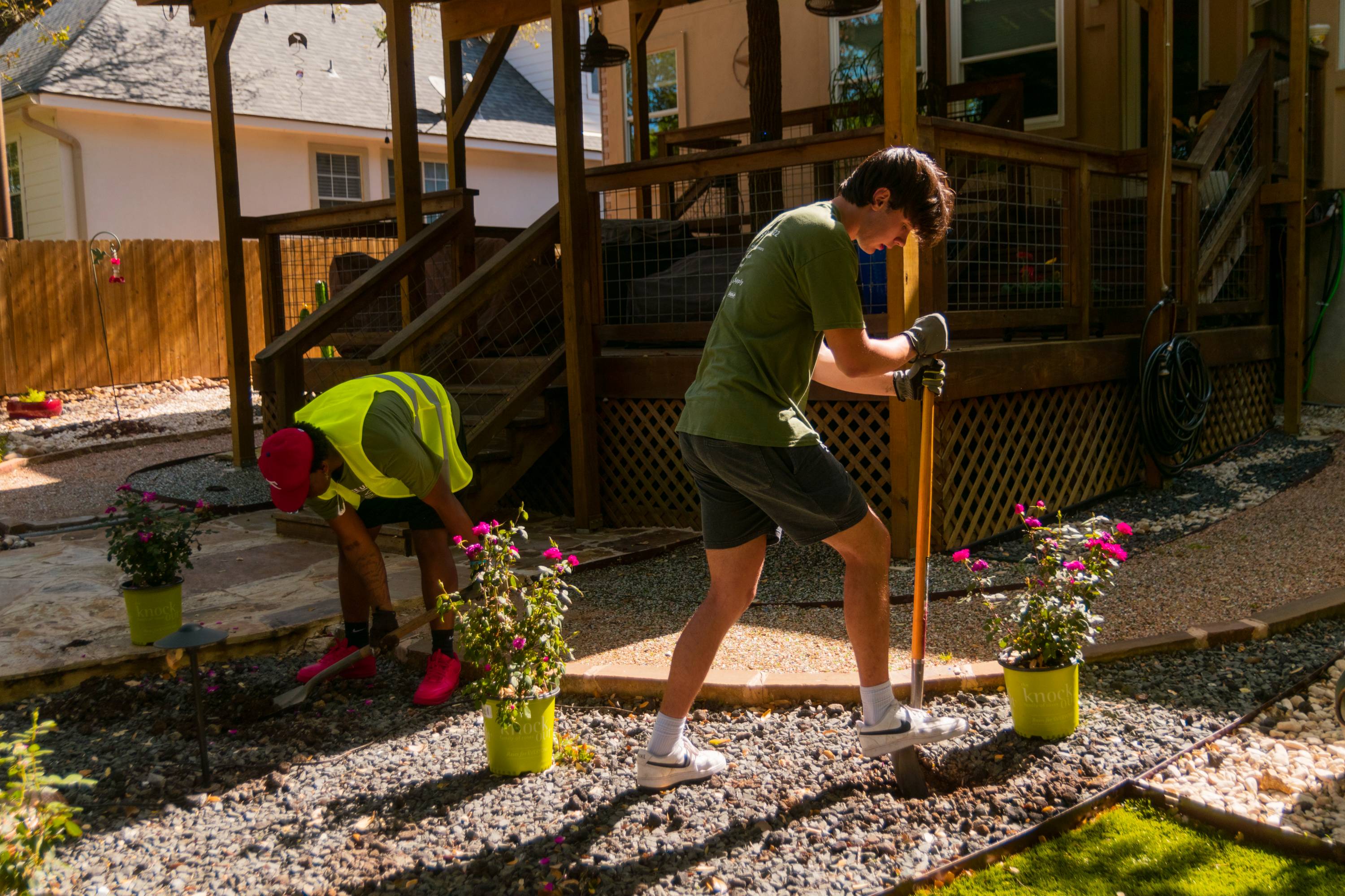 Volunteers in resident's garden