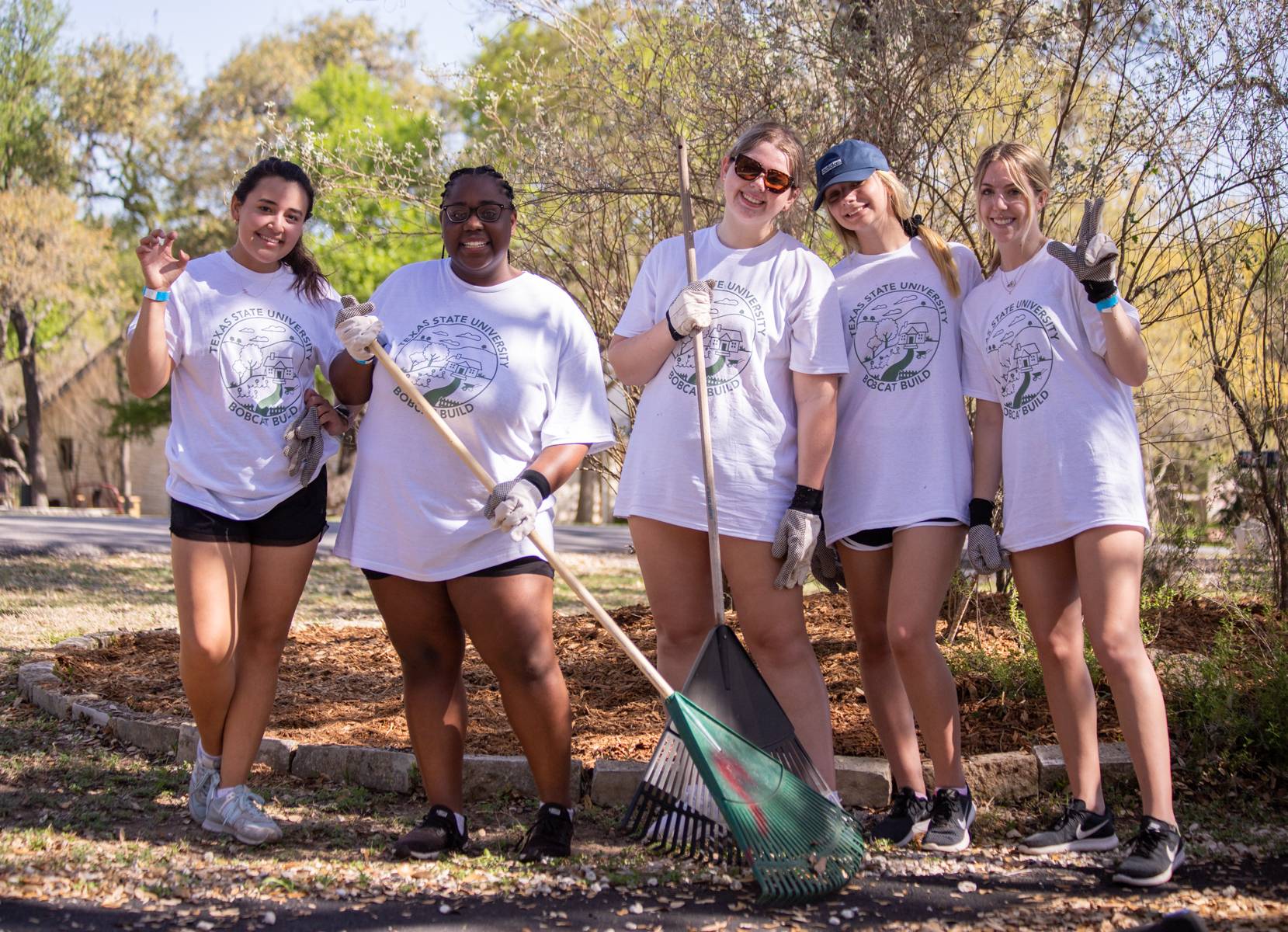 Students taking picture during volunteering