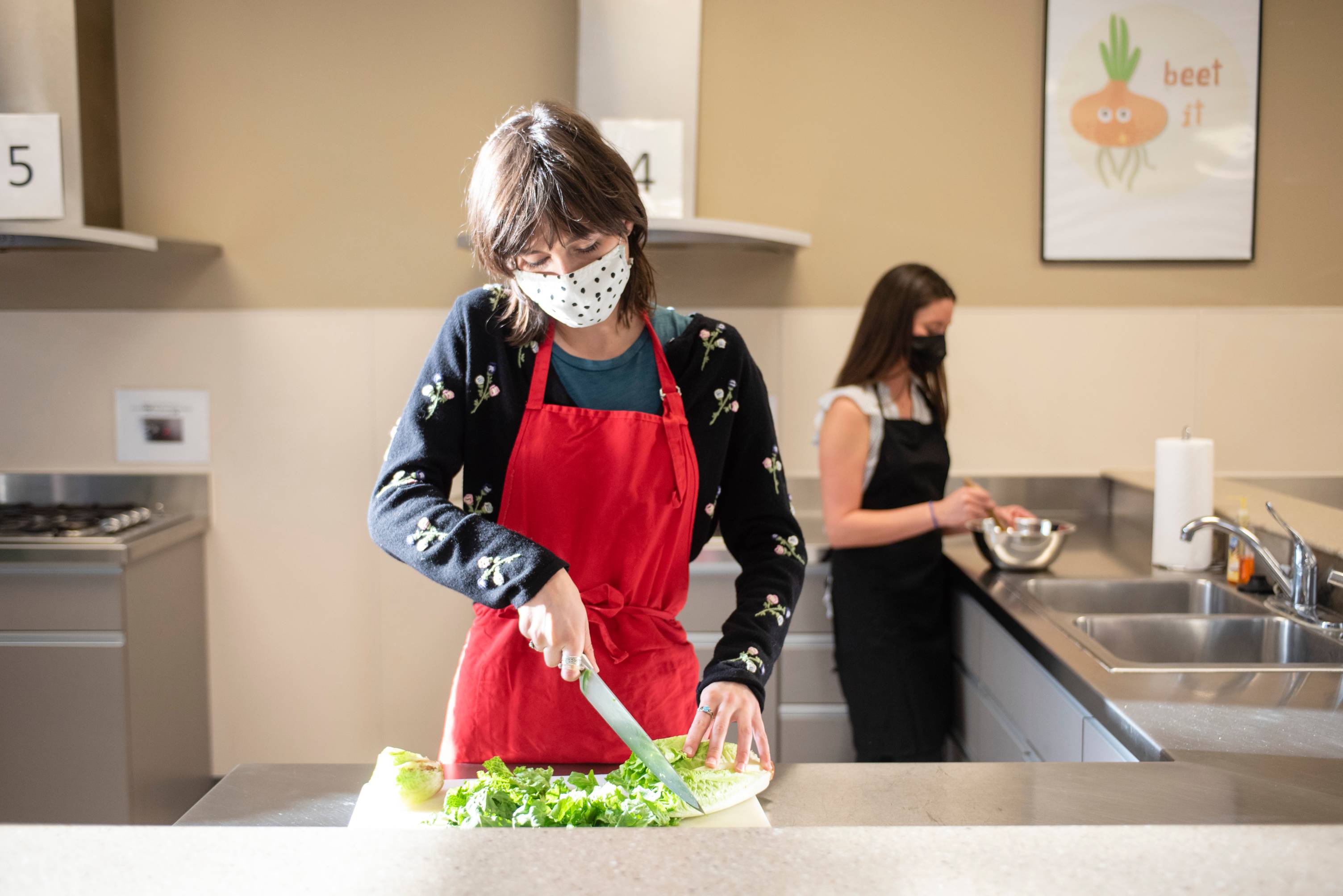 Woman Cutting Lettuce