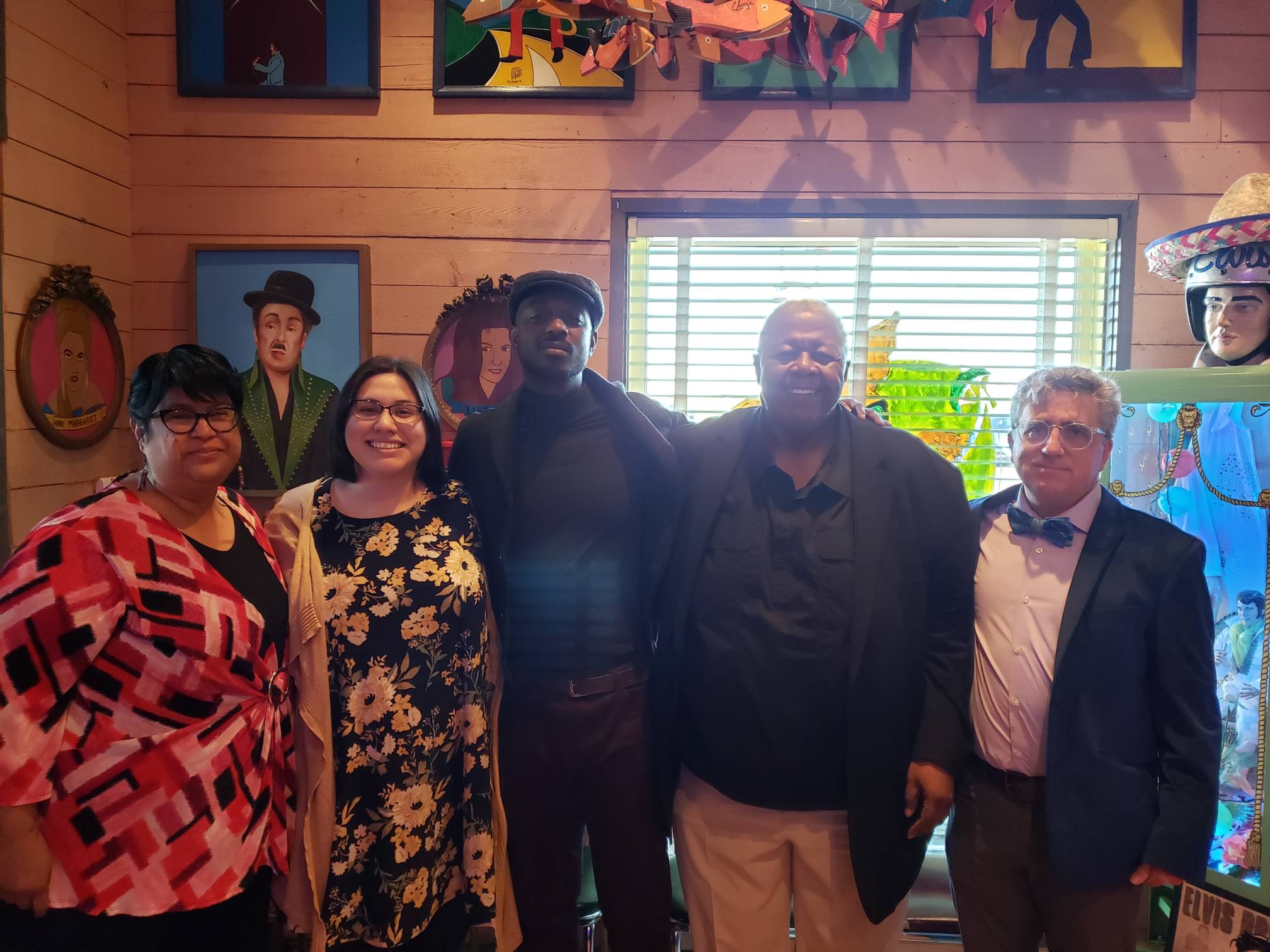 Photo of Ricardo Lowe and professors who attended the event