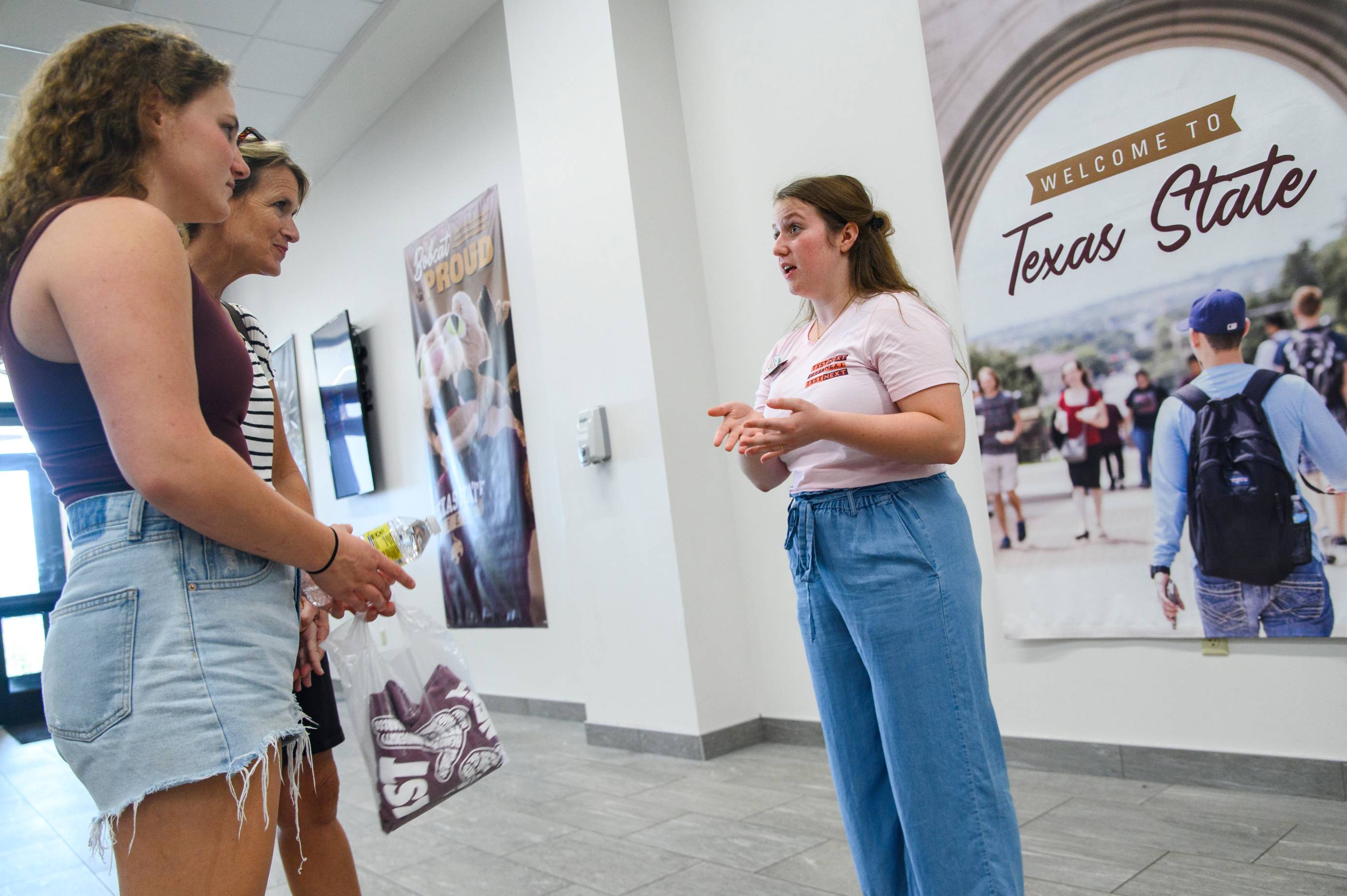 Students standing in the LBJ Student Center