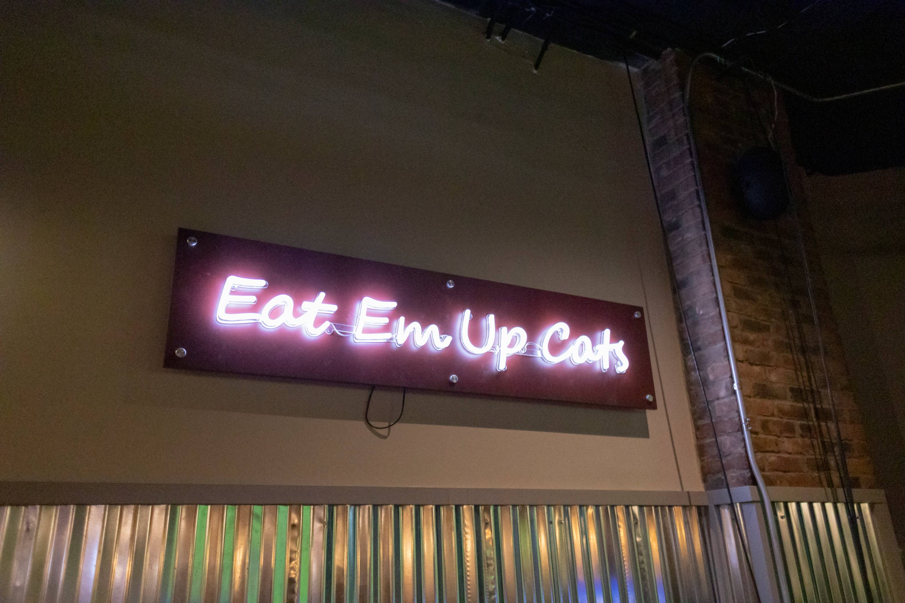 Eat em Up Cat's neon sign