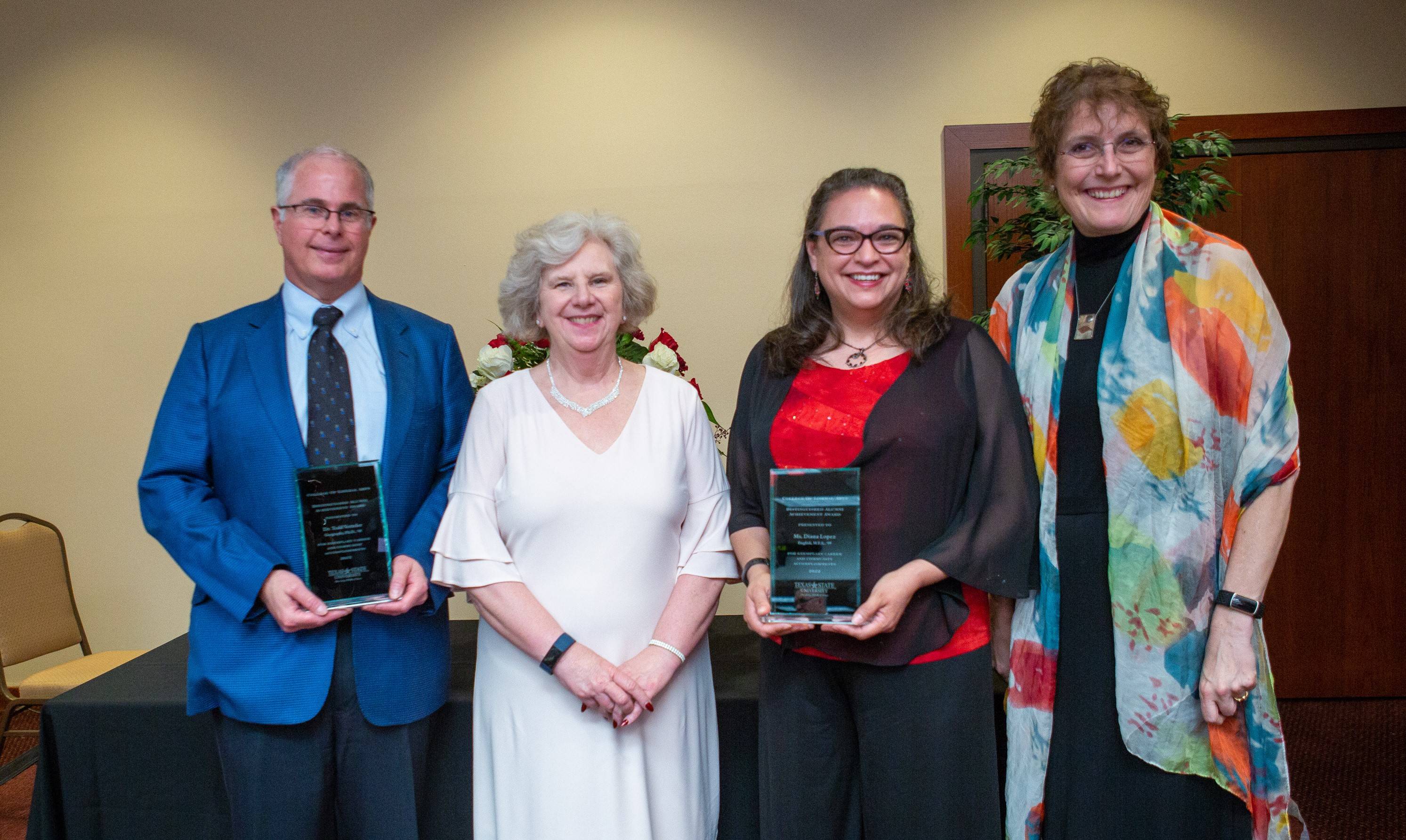 Photo of 2022 distinguished alumni honorees with Dean Brennan and Dr. Golato