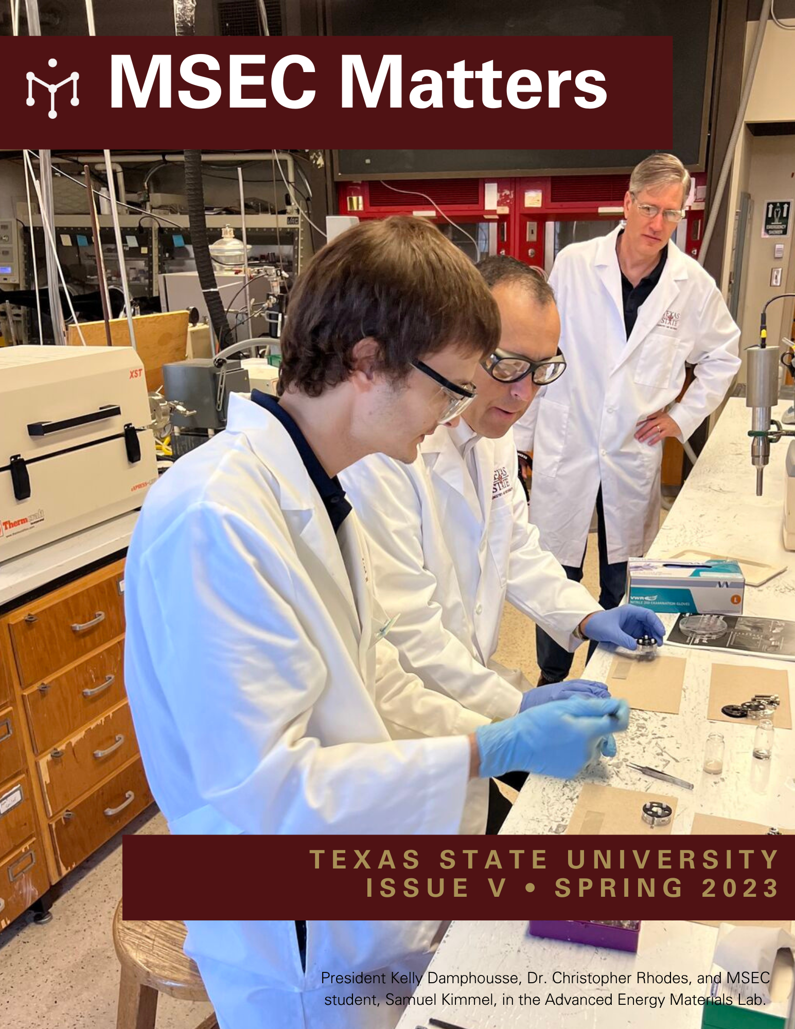 Newsletter cover page with photo of students in lab