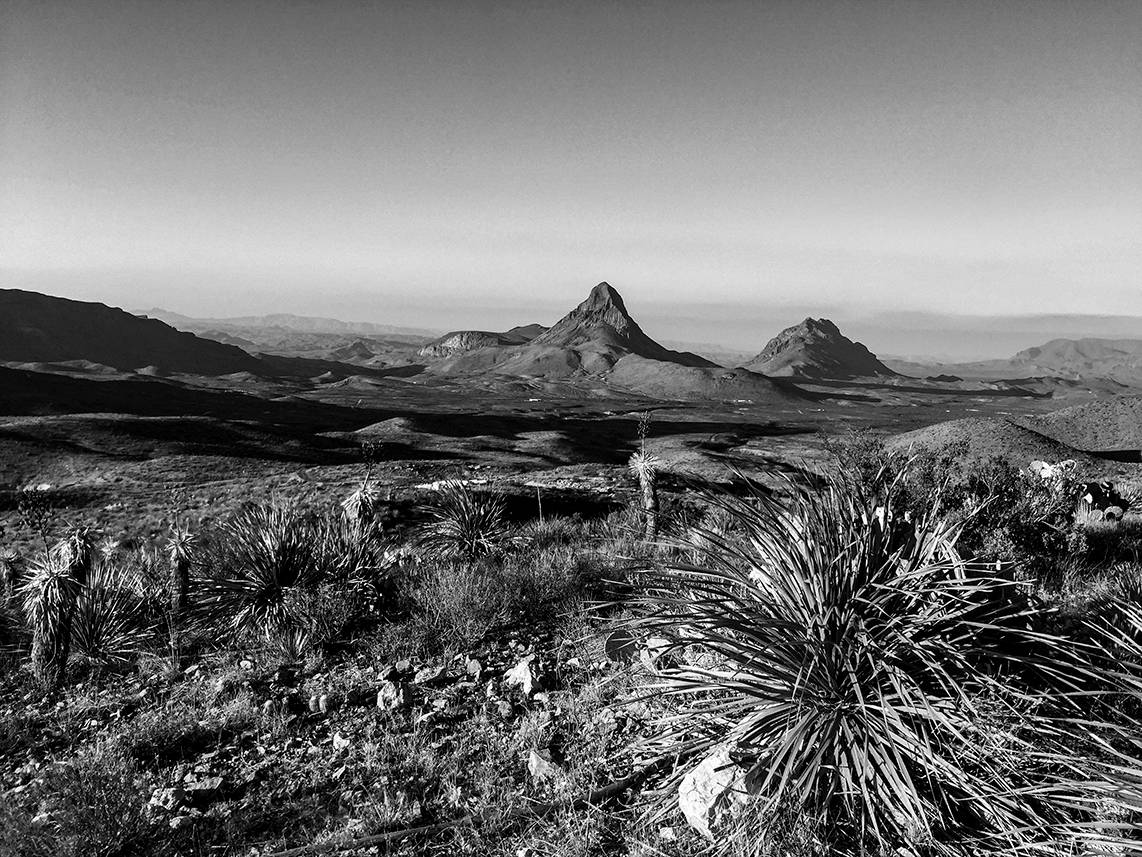 black and white photo of mountain peak