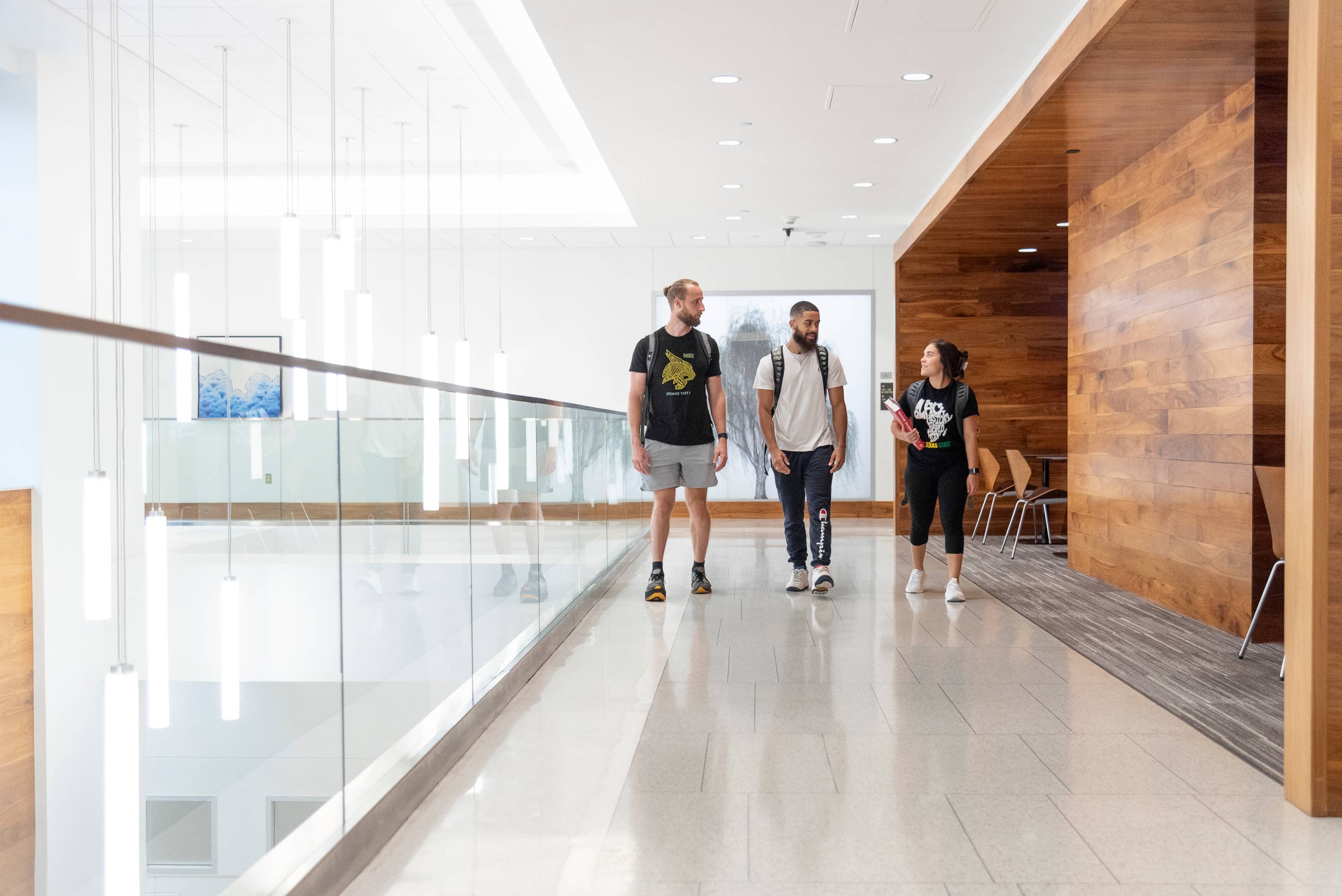 three students walking in willow hall