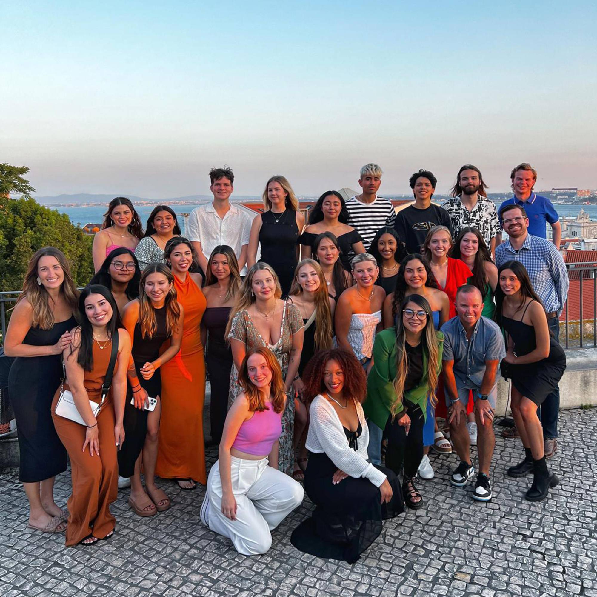 Students and faculty at sunset in Lisbon