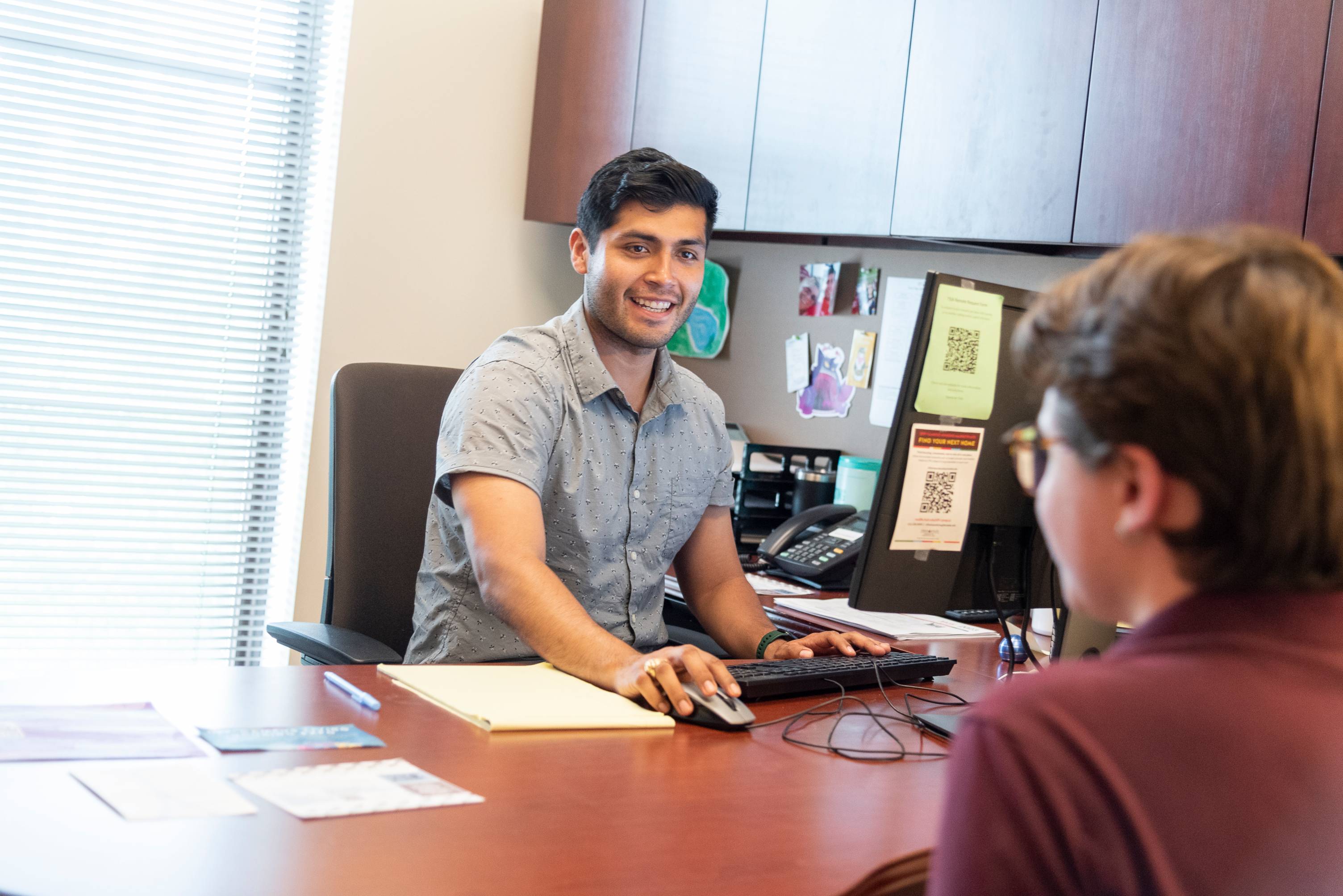 An advisor working with a student.