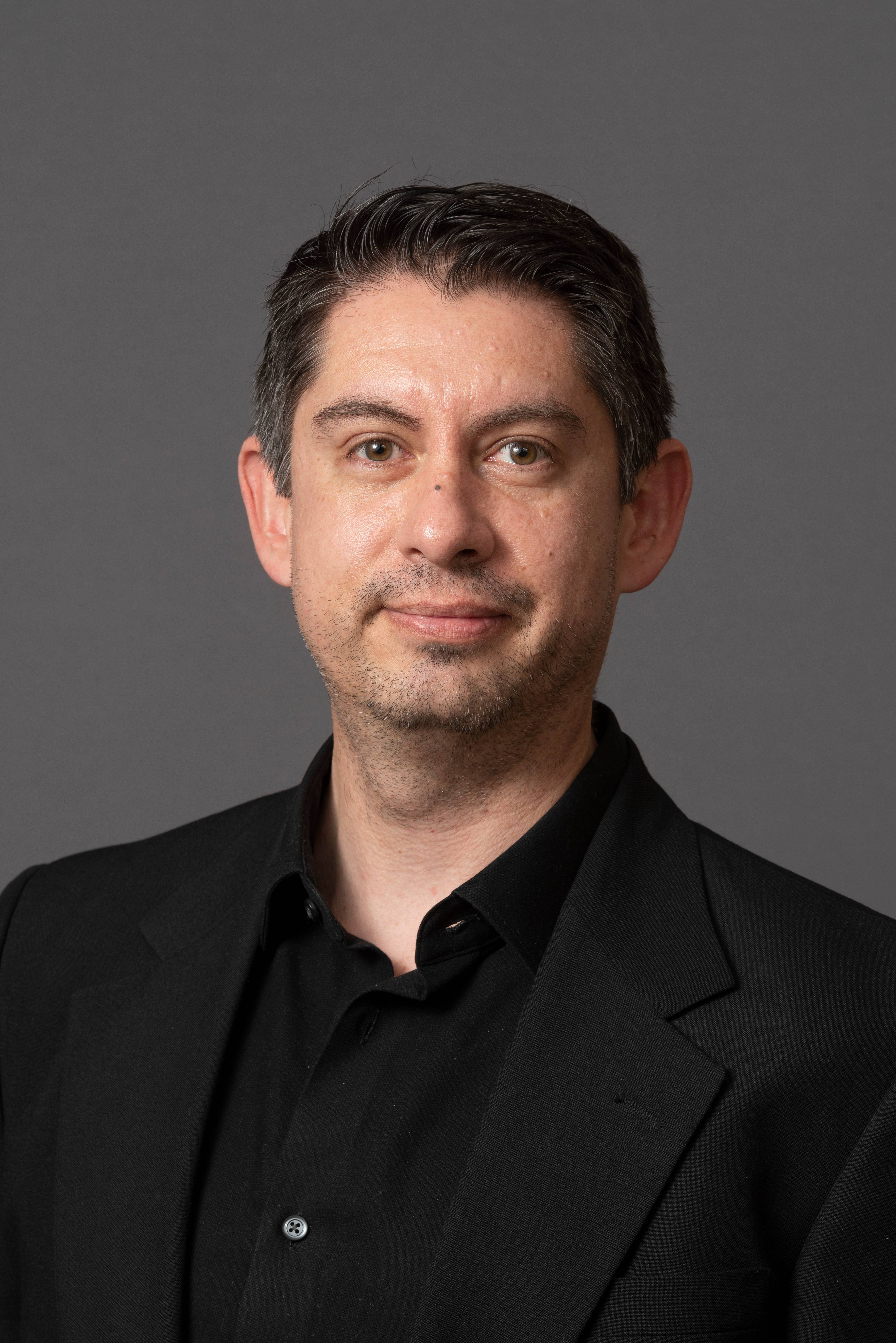Headshot of Dr. Damian Molina