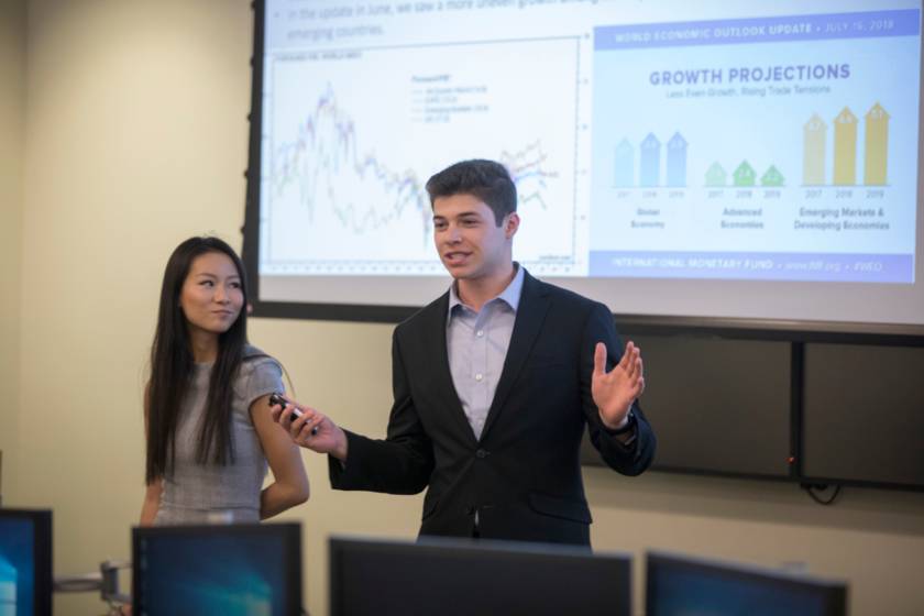 Business students presenting in a class