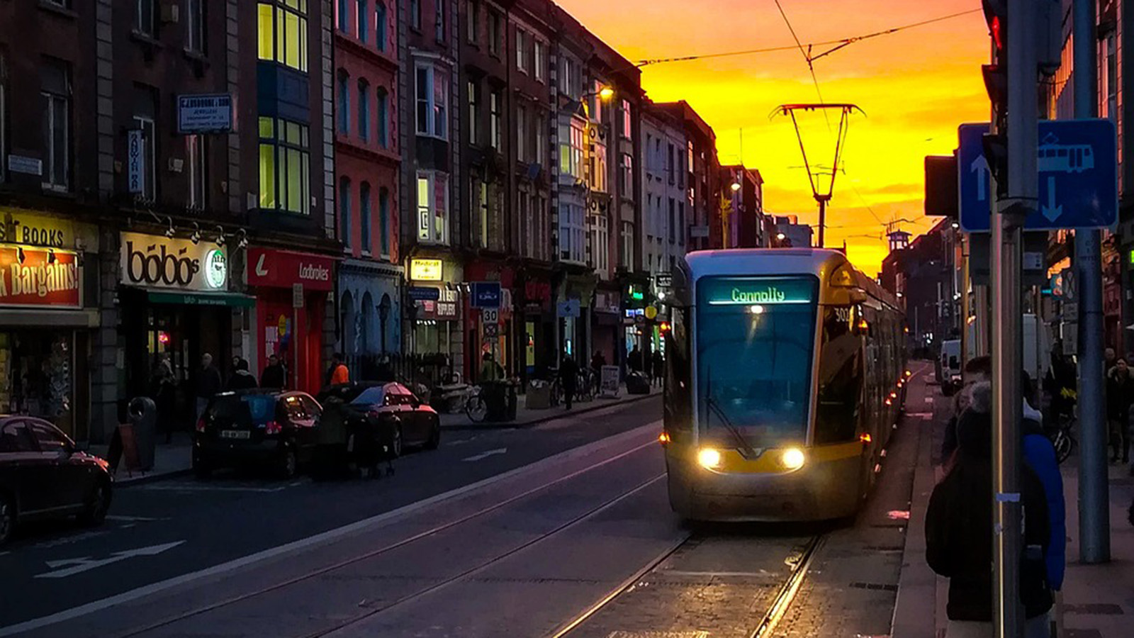 Train and city of Dublin at sunset