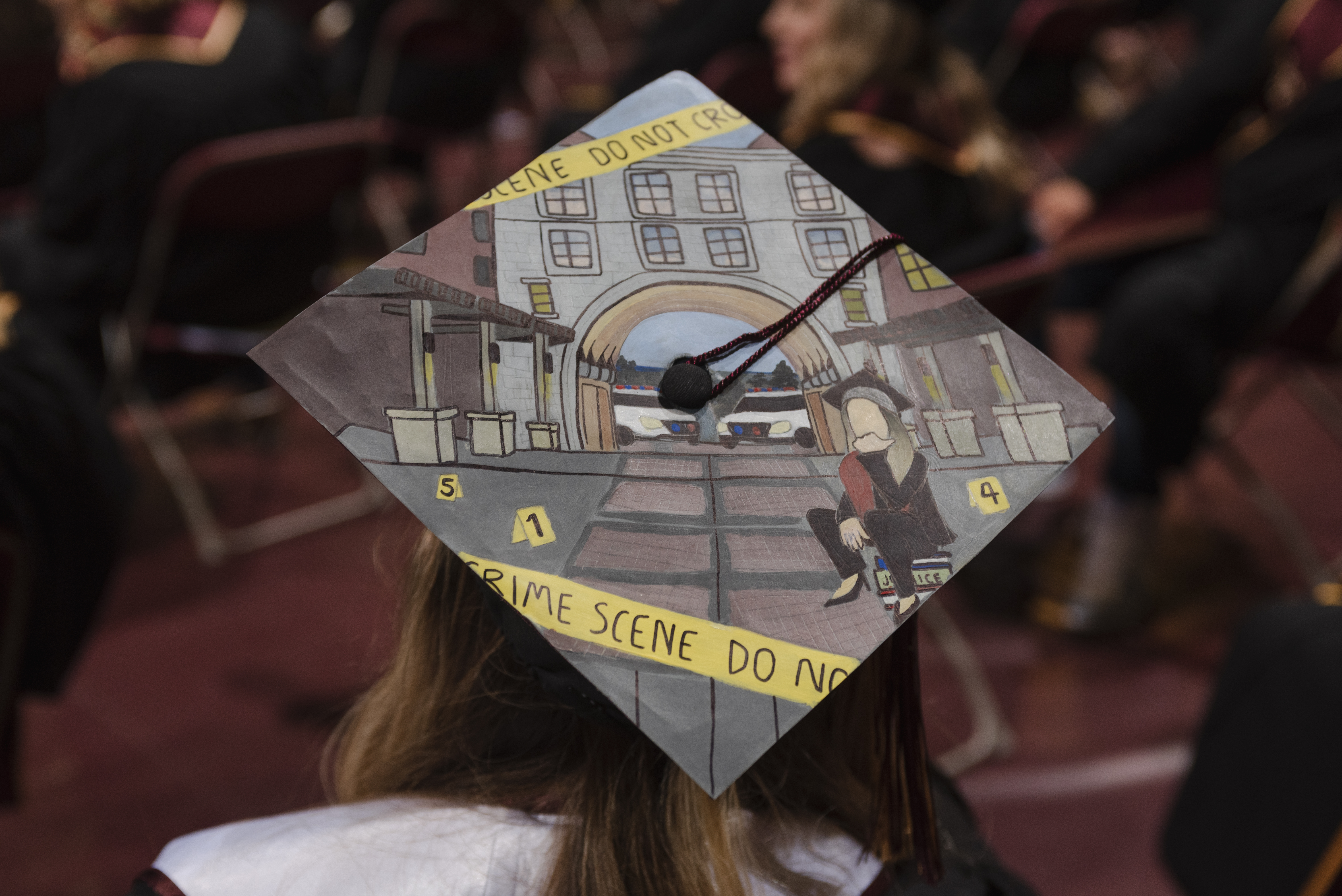 A commencement cap that one of the students from Texas State University using for their commencement