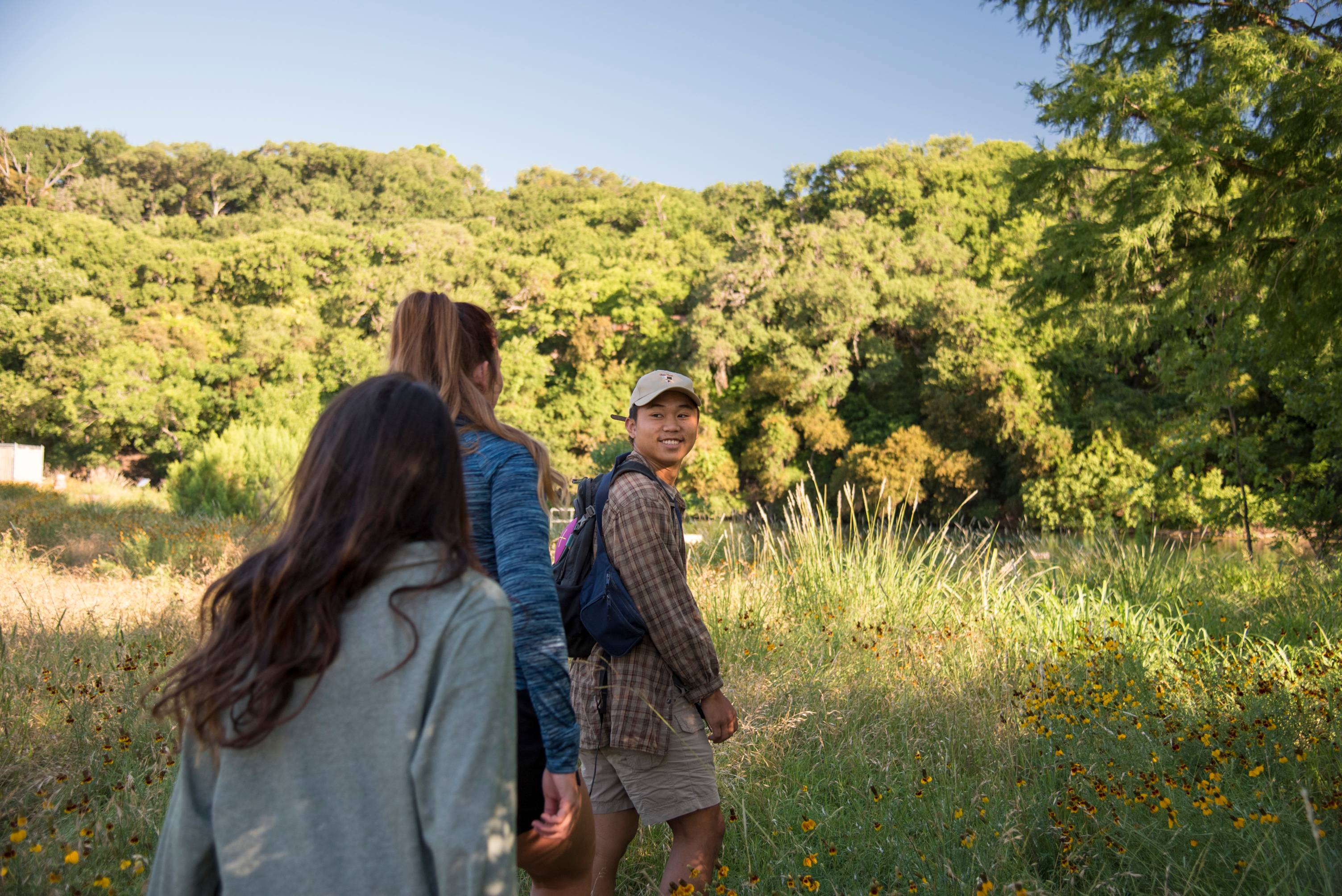 Three students hiking