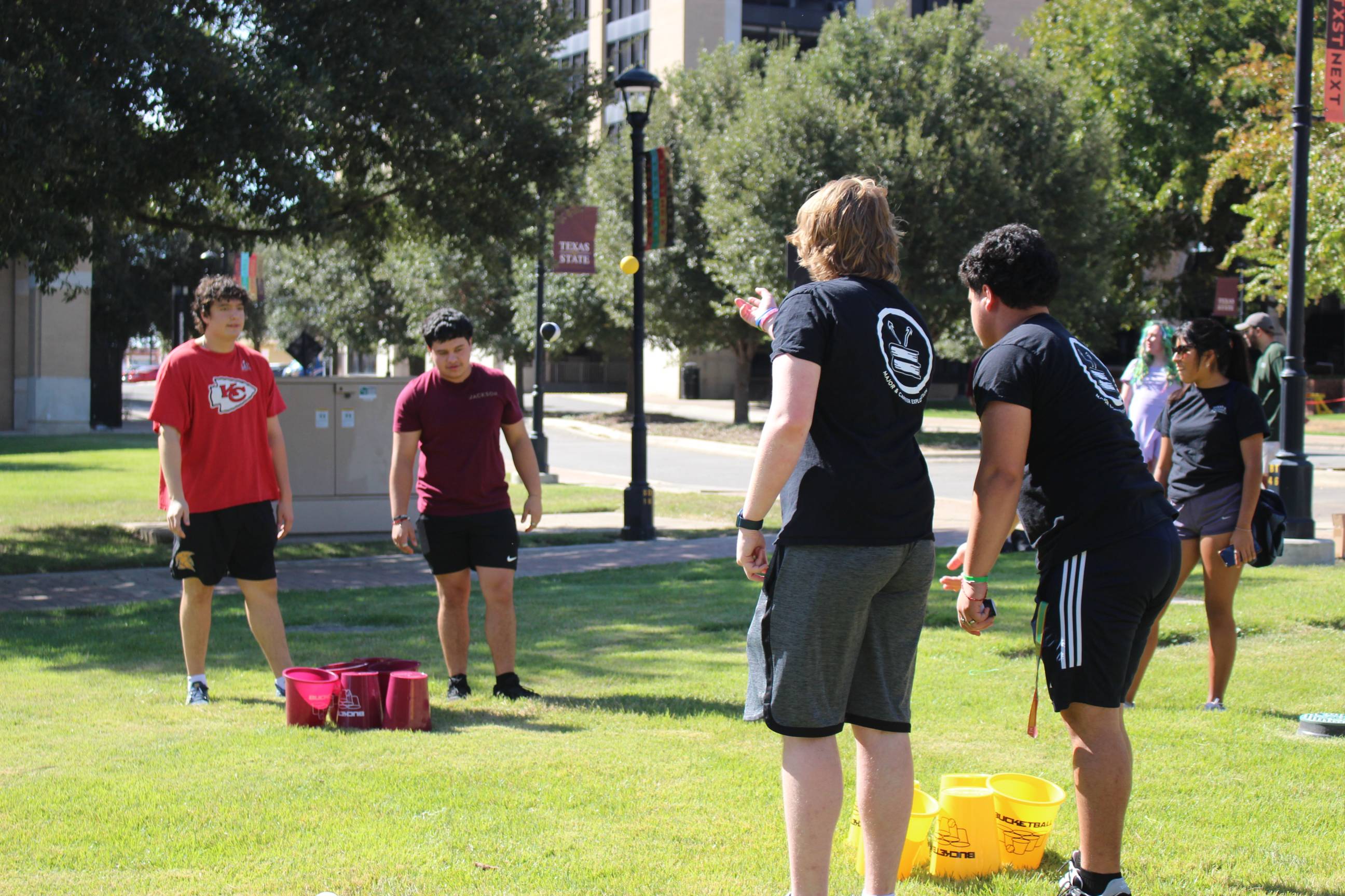 Four boys playing a field game