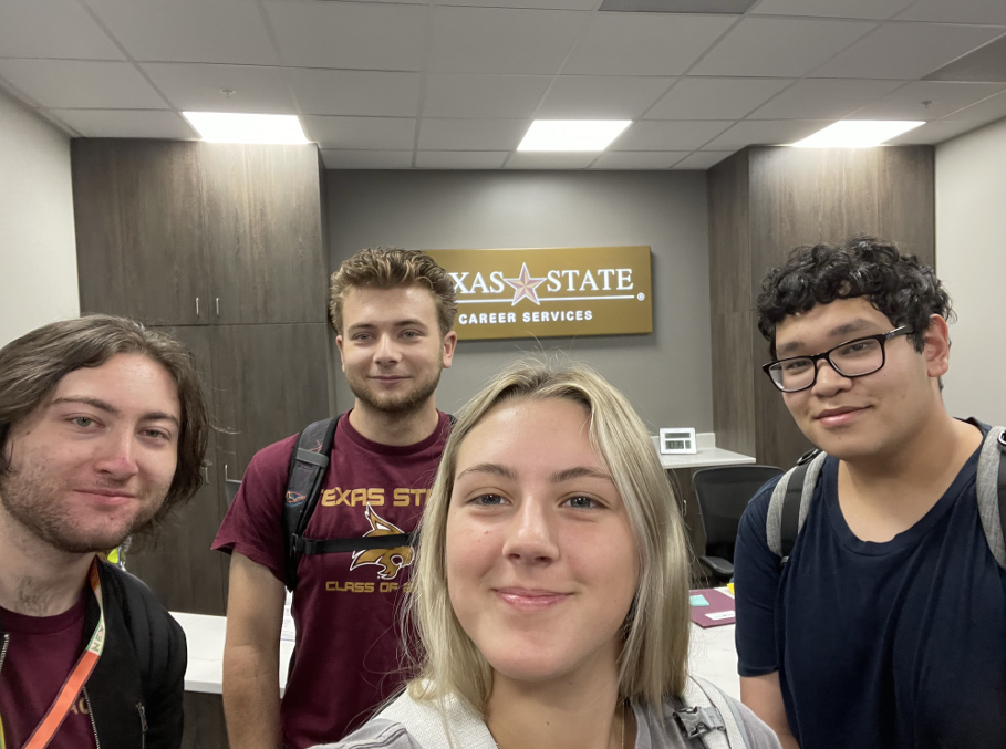 Students taking a selfie at career services