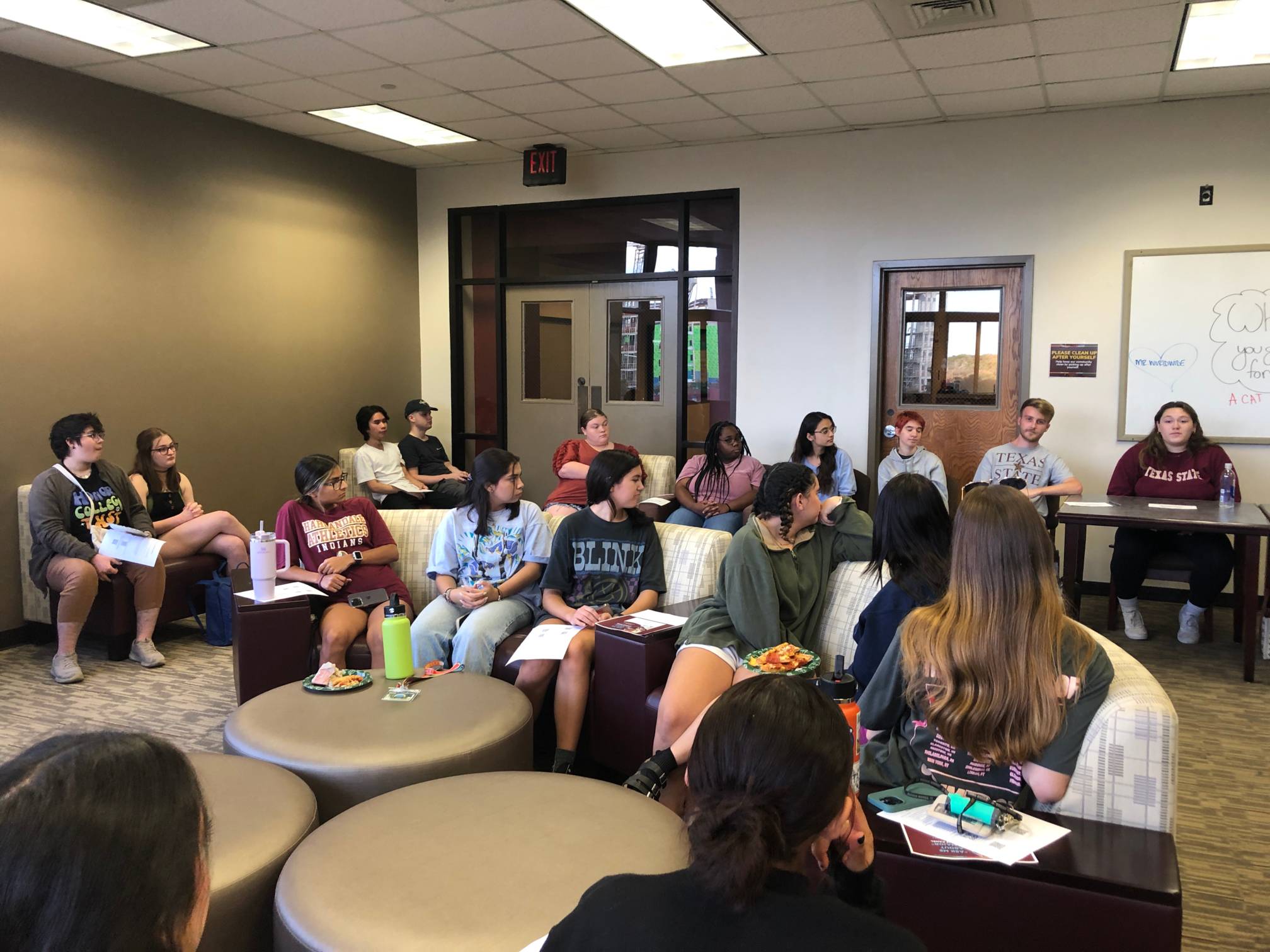 Group of students at a panel in Jackson hall