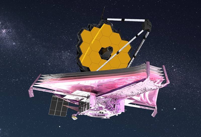 Artist conception of the James Webb Space Telescope. The large yellow telescope sits atop a large mount in space.