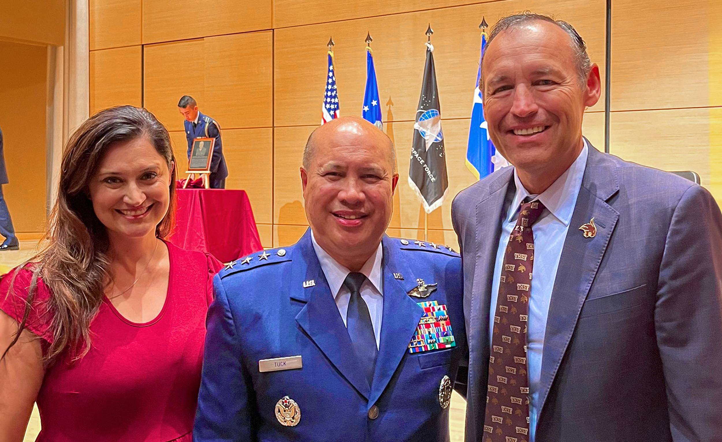 President Damphousse poses for a group photo with air force ROTC alum