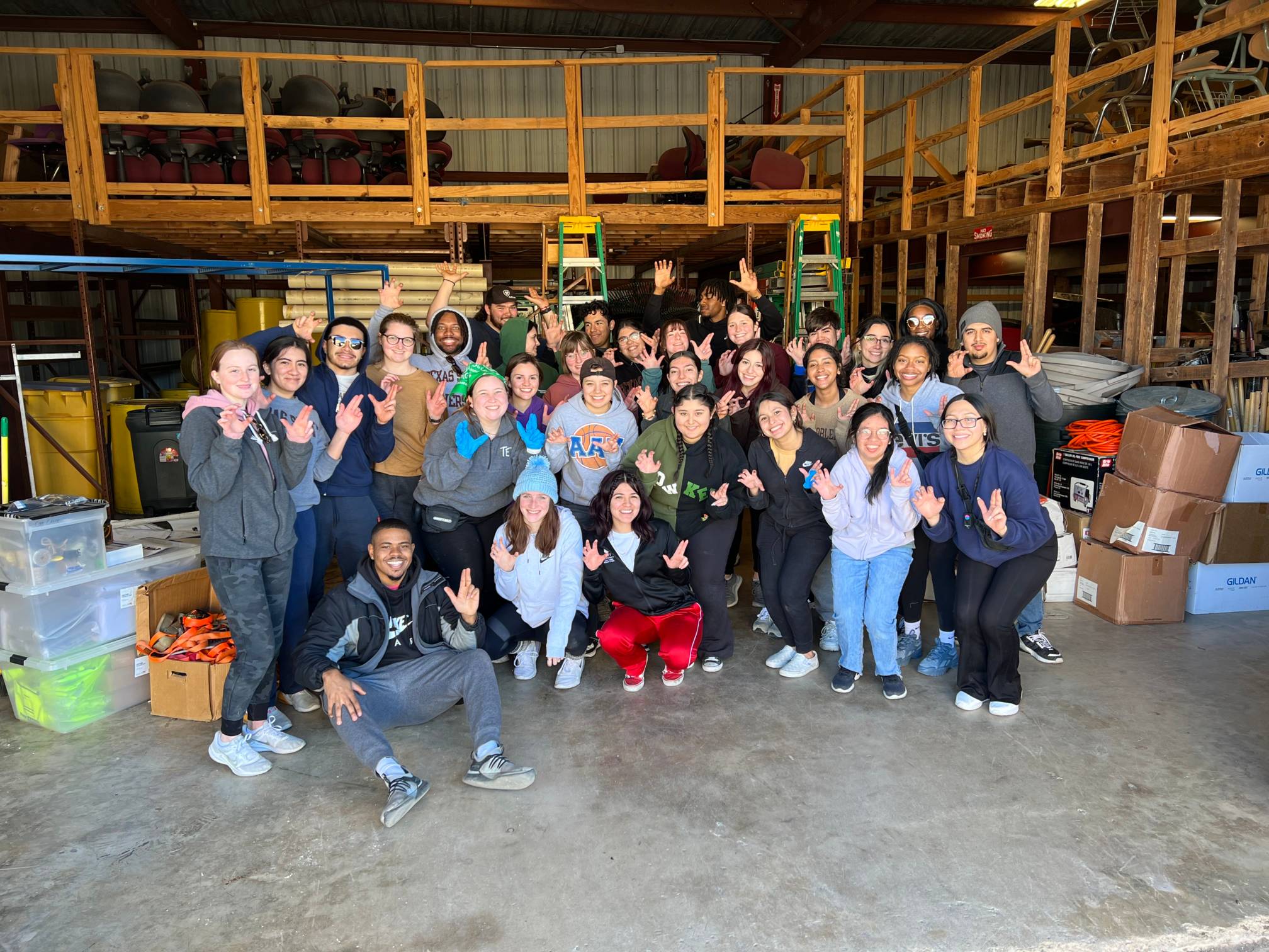 Committee members at the tool shed doing inventory