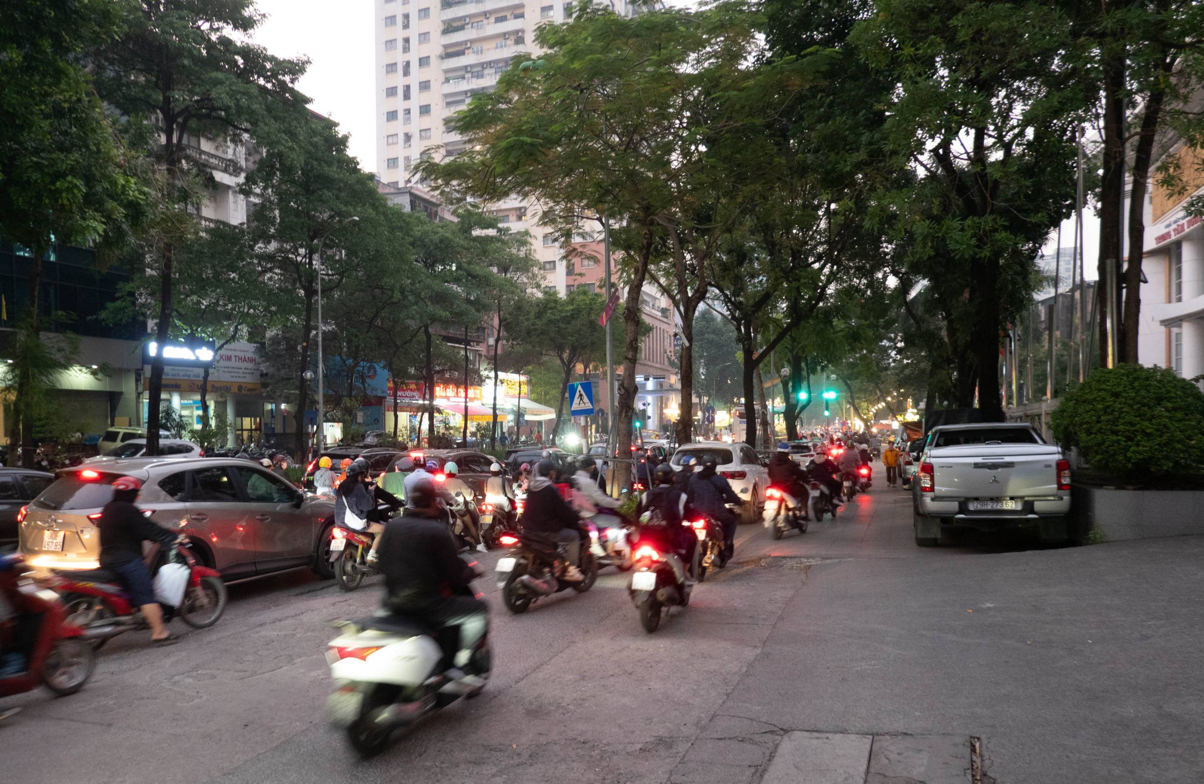 Crowded scene of motorbikes and cars