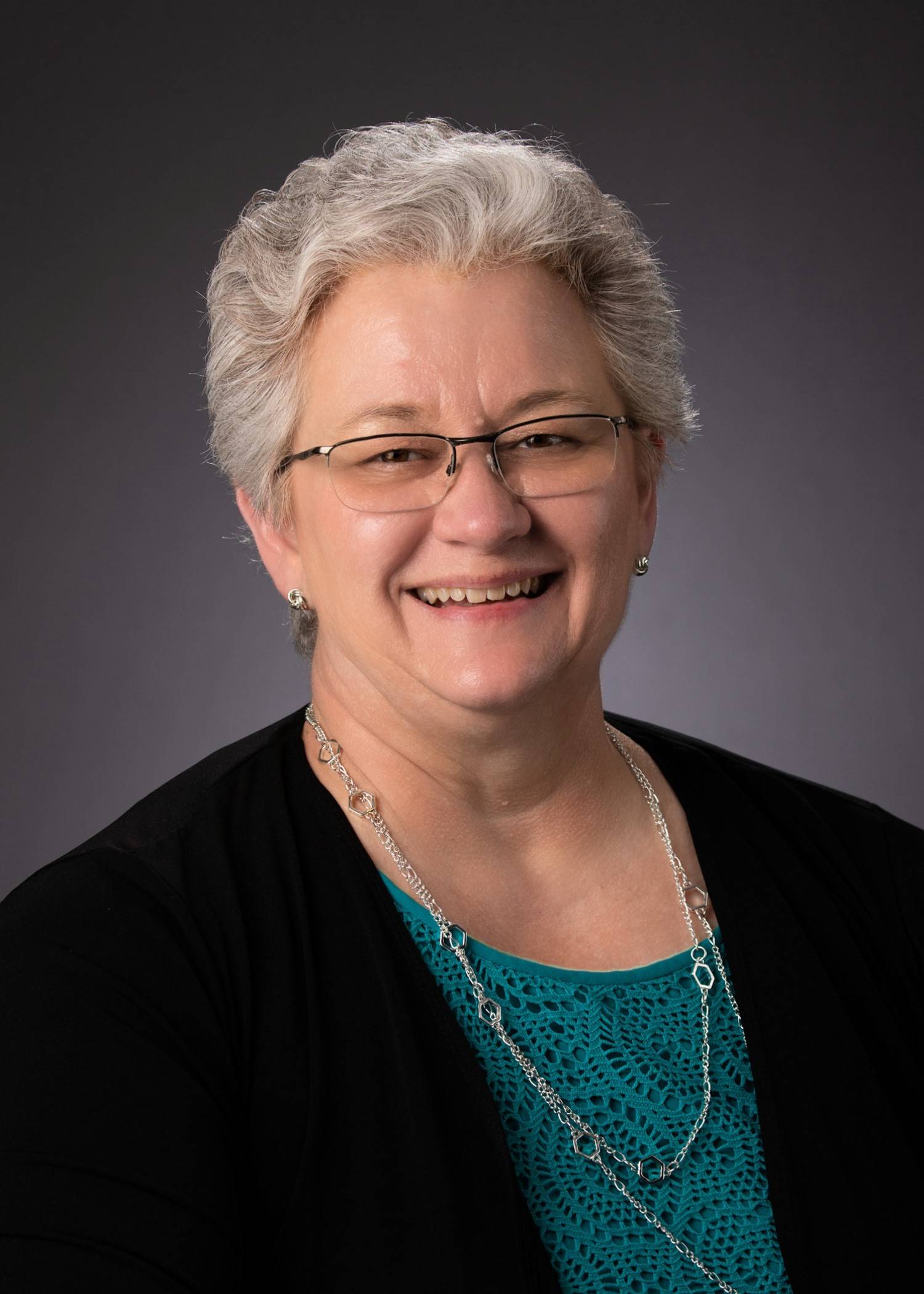 Headshot of Peggy Mica. 