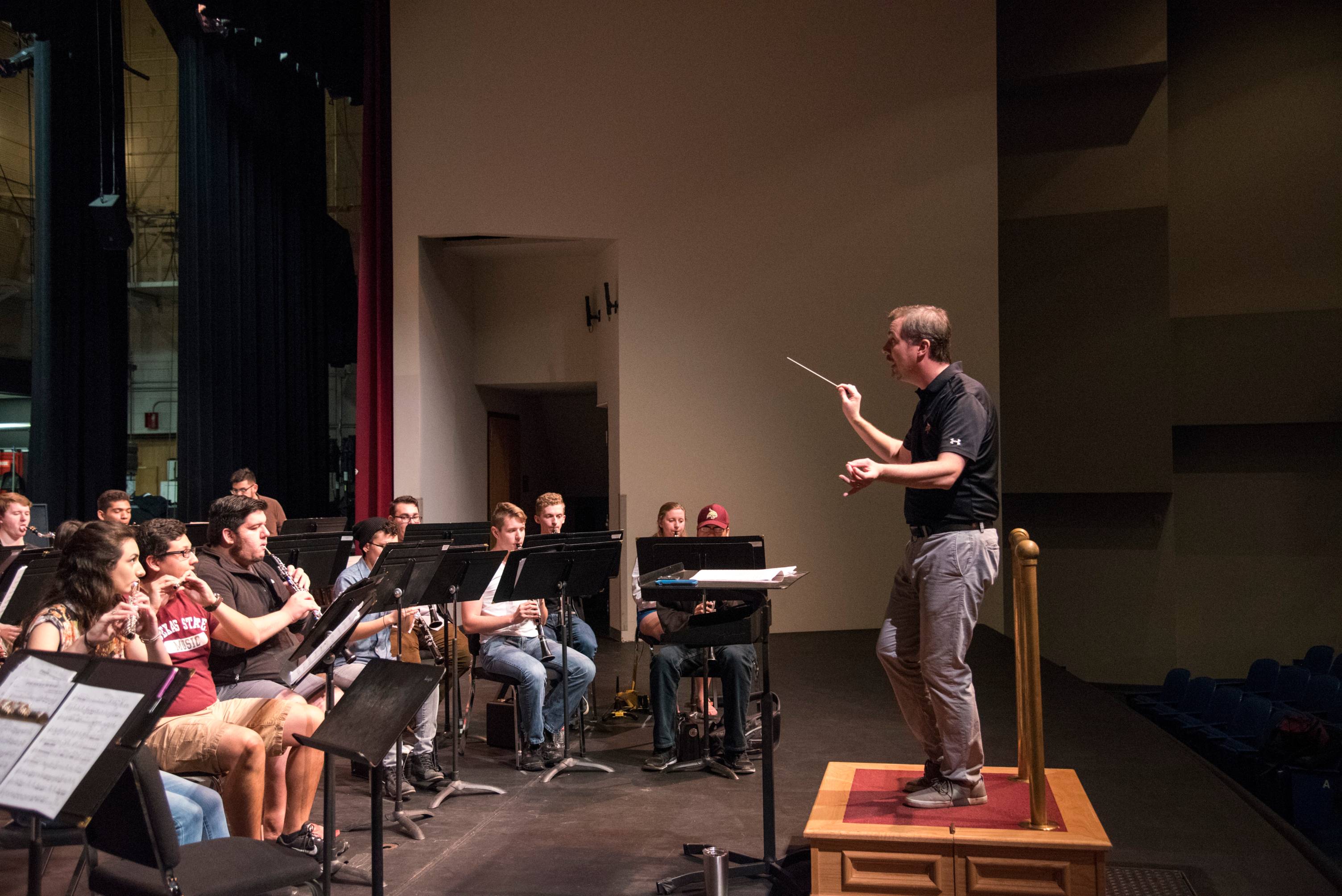 Kyle Glaser Conducting a Band