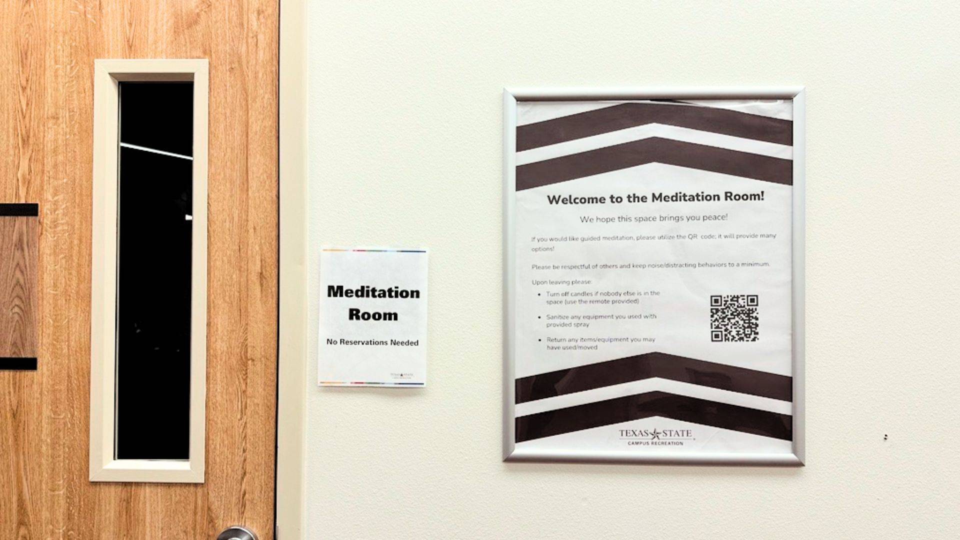 Image of a door and sign with text reading welcome to the meditation room.
