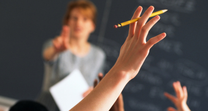 student raising their hand