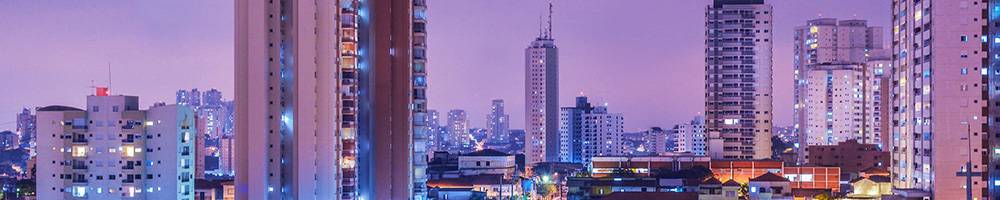 Illuminated city skyline at dusk in Brazil