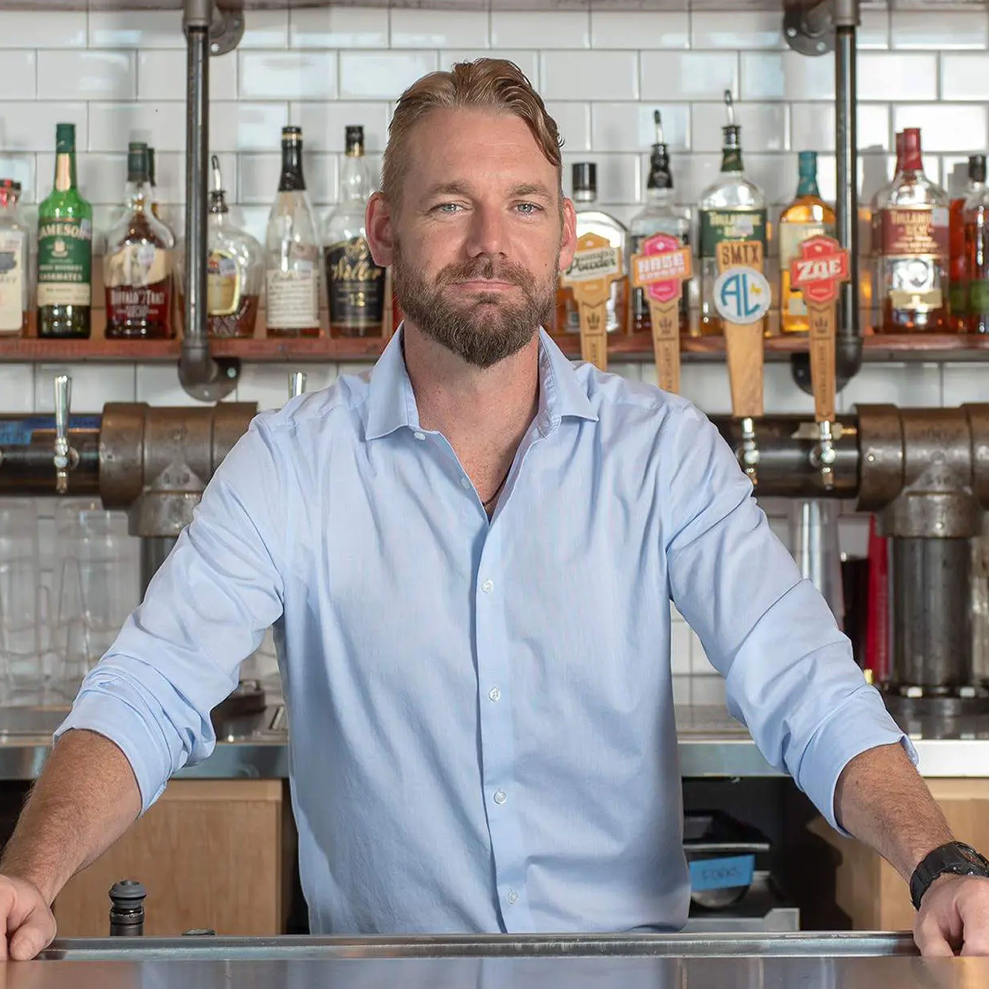 Photo of Cody Taylor in his restaurant.