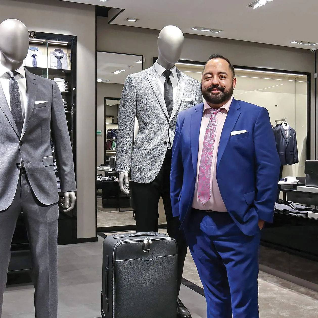 photo of J.D Hernandez inside one of his stores.