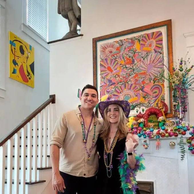 Couple wearing Mardi Gras clothing together