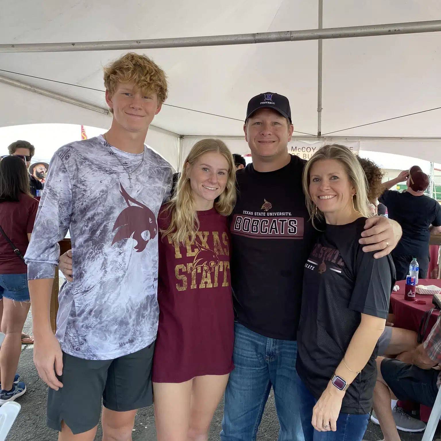 Family photo at Texas State tailgate