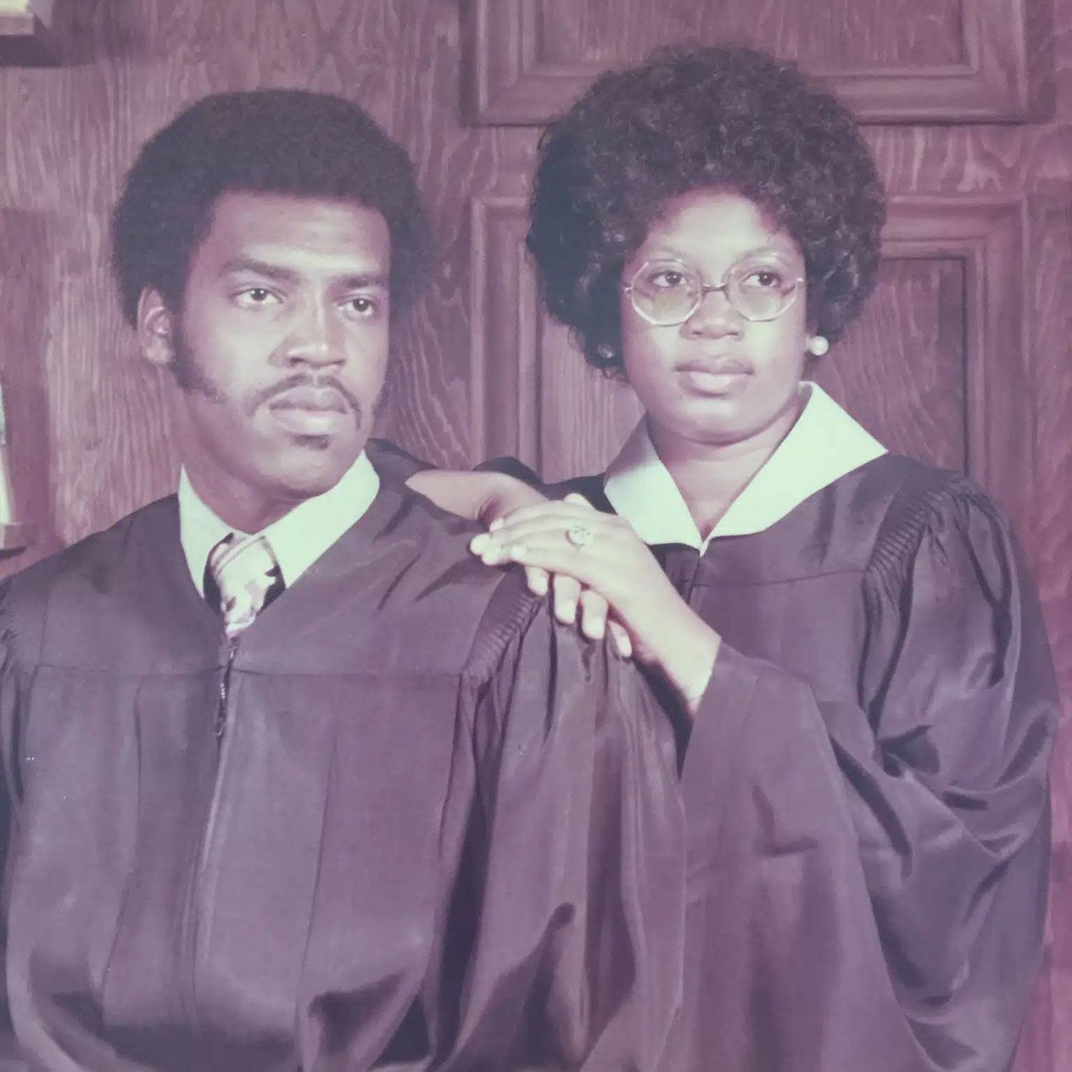 Photo of couple wearing judicial garments