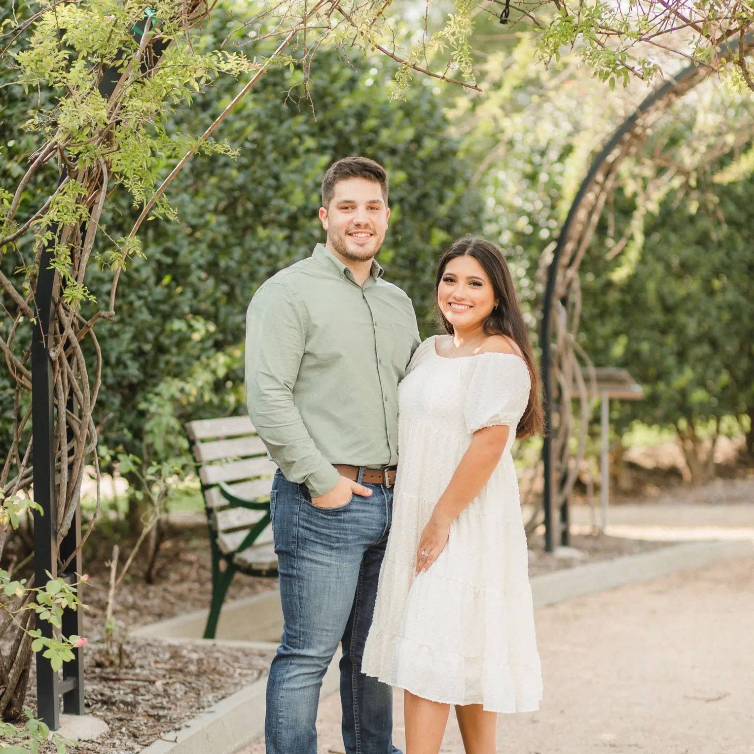 photo of couple in brightly lit forest